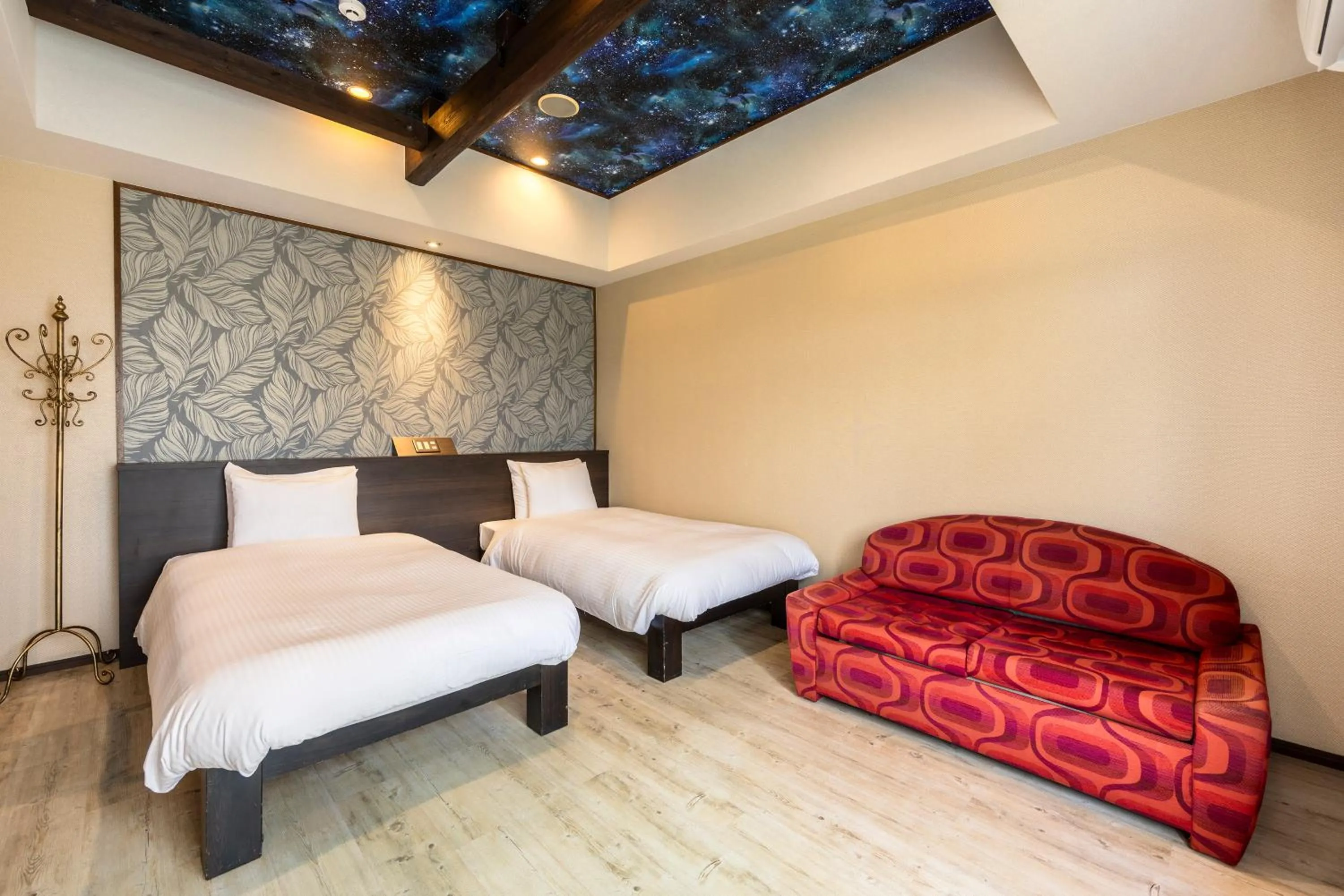 Bed in La Casa Panacea Okinawa Resort