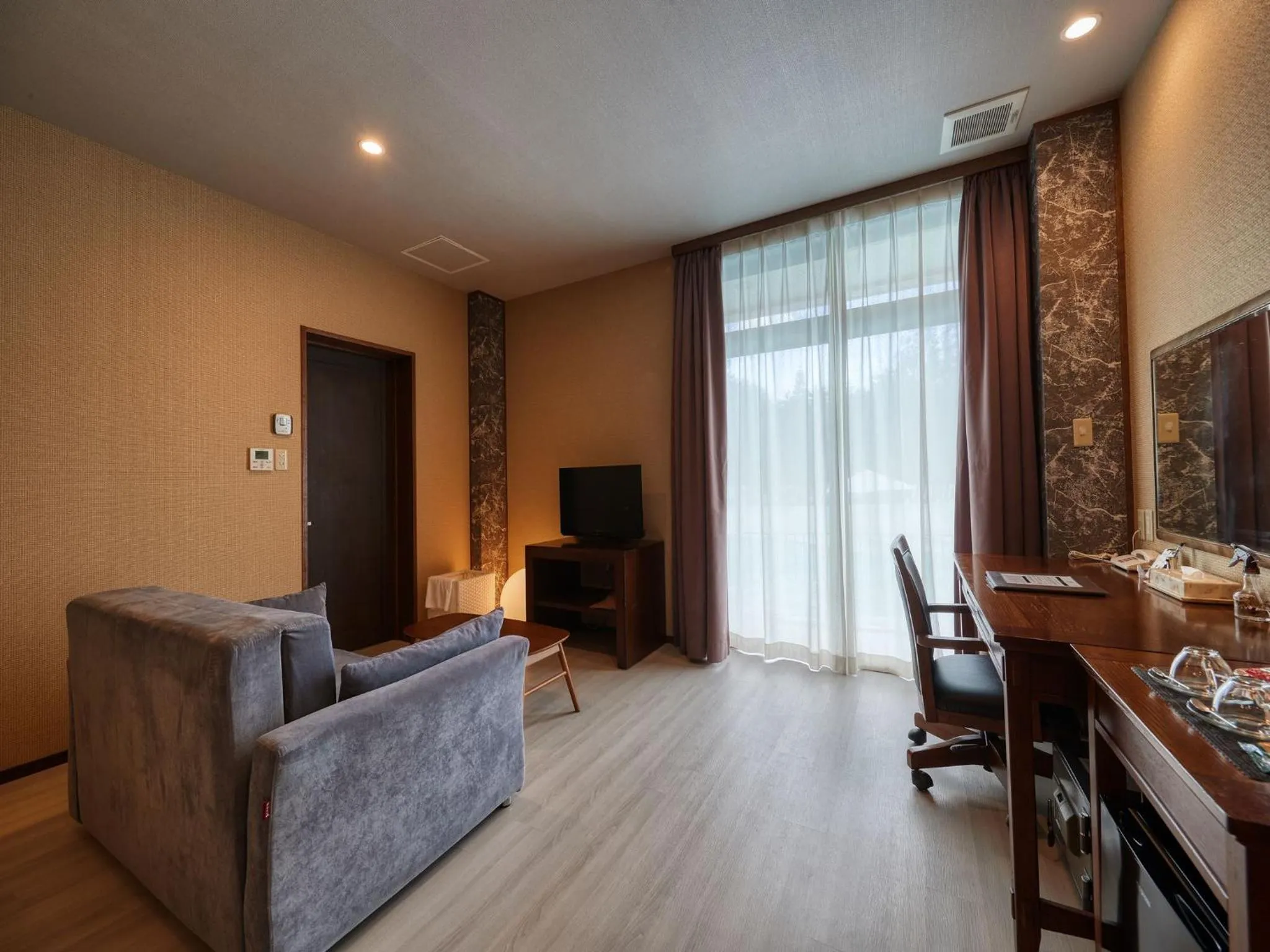 Seating area in La Casa Panacea Okinawa Resort