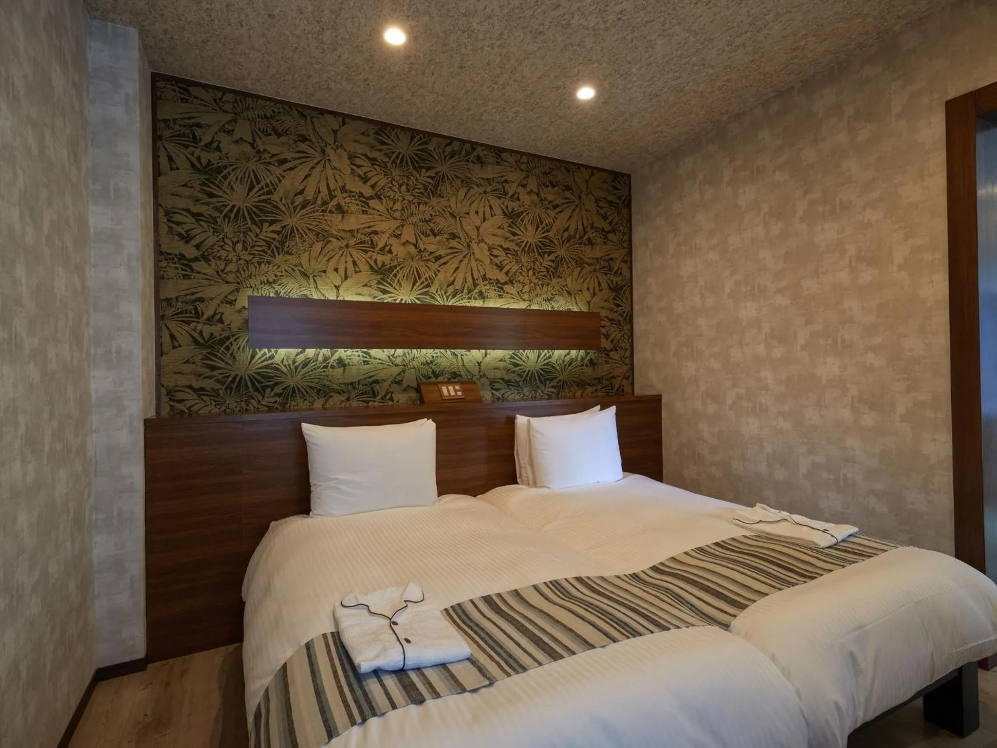 Photo of the whole room, Bed in La Casa Panacea Okinawa Resort