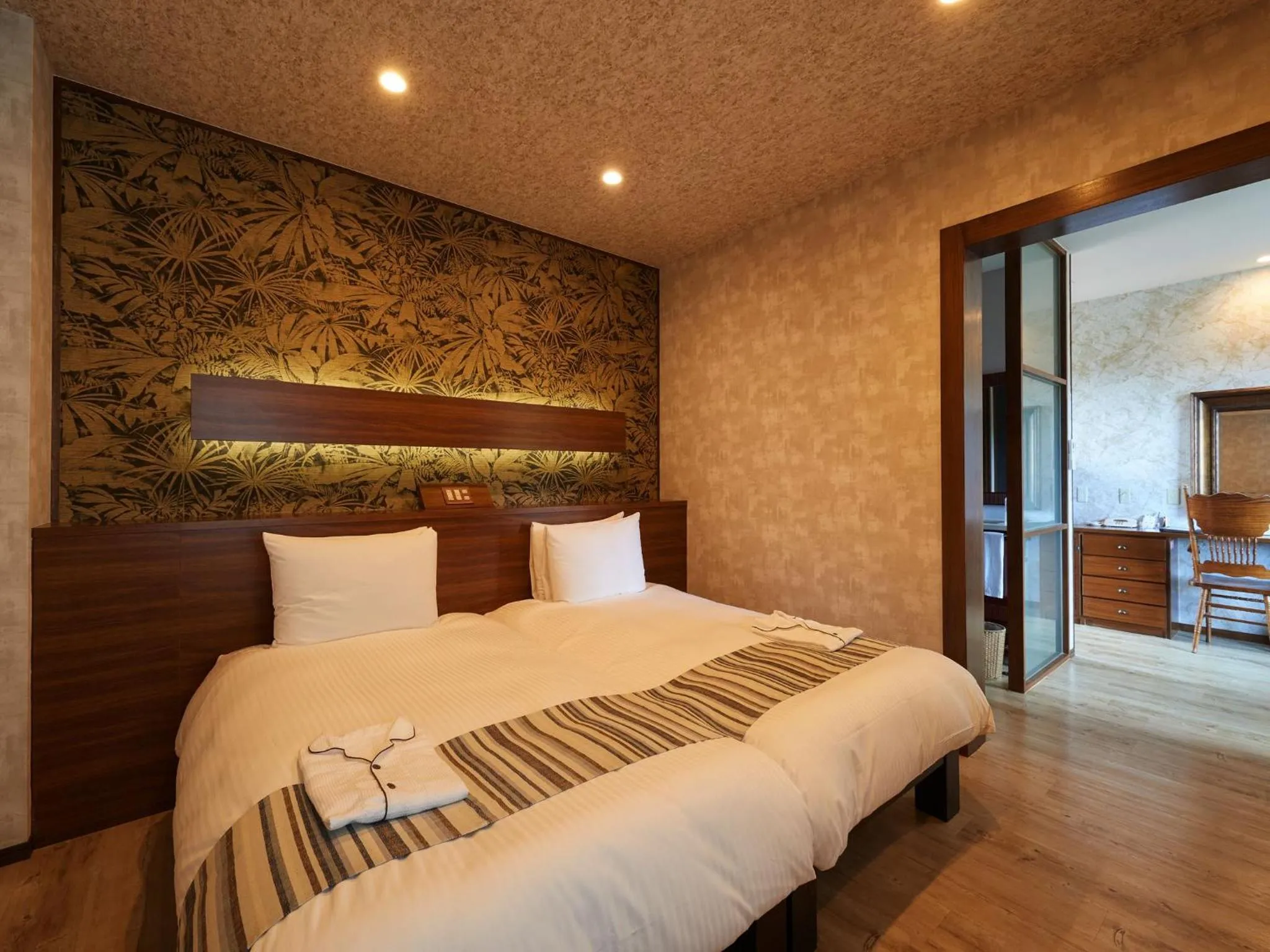 Photo of the whole room, Bed in La Casa Panacea Okinawa Resort