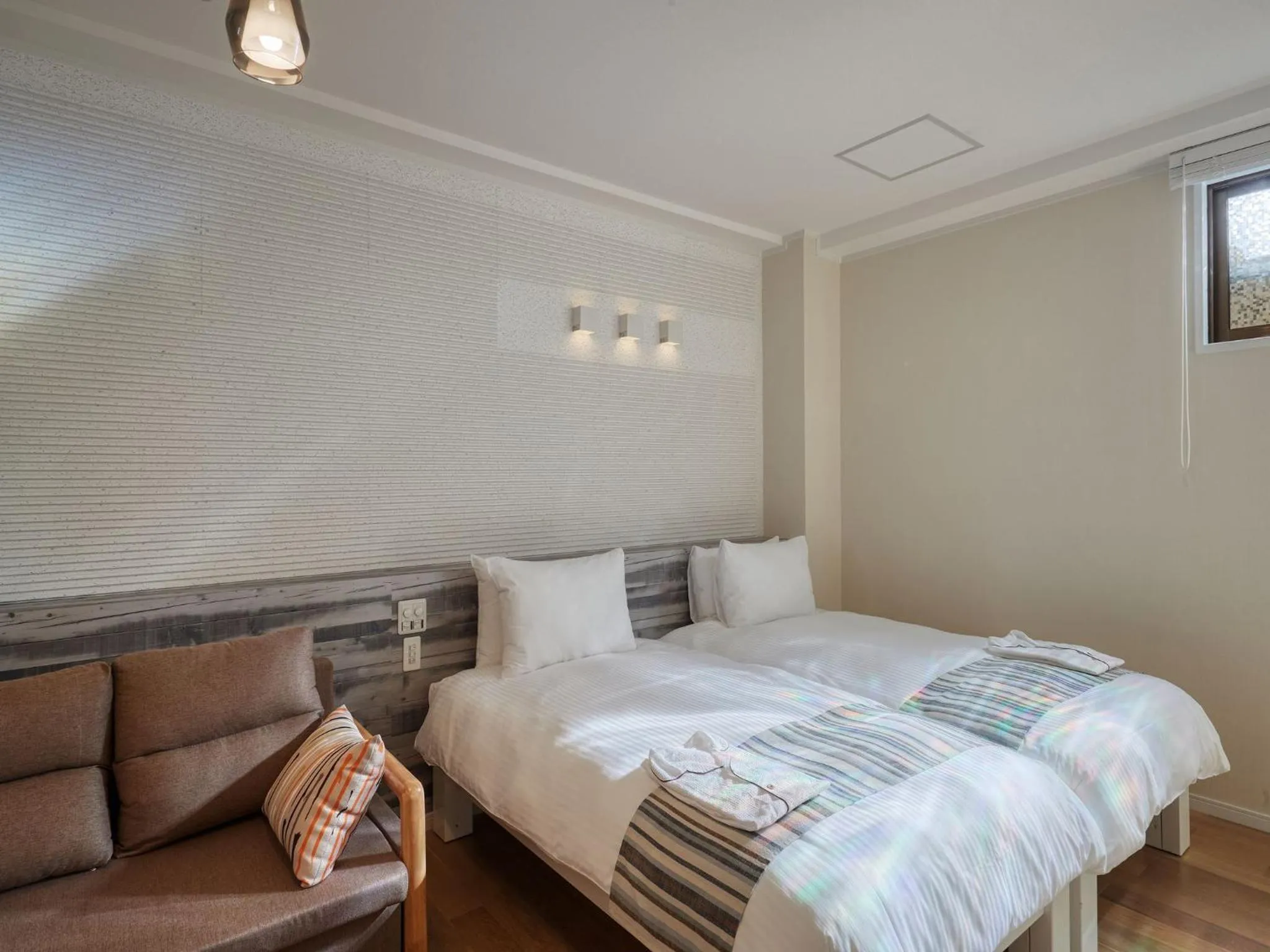 Photo of the whole room, Bed in La Casa Panacea Okinawa Resort