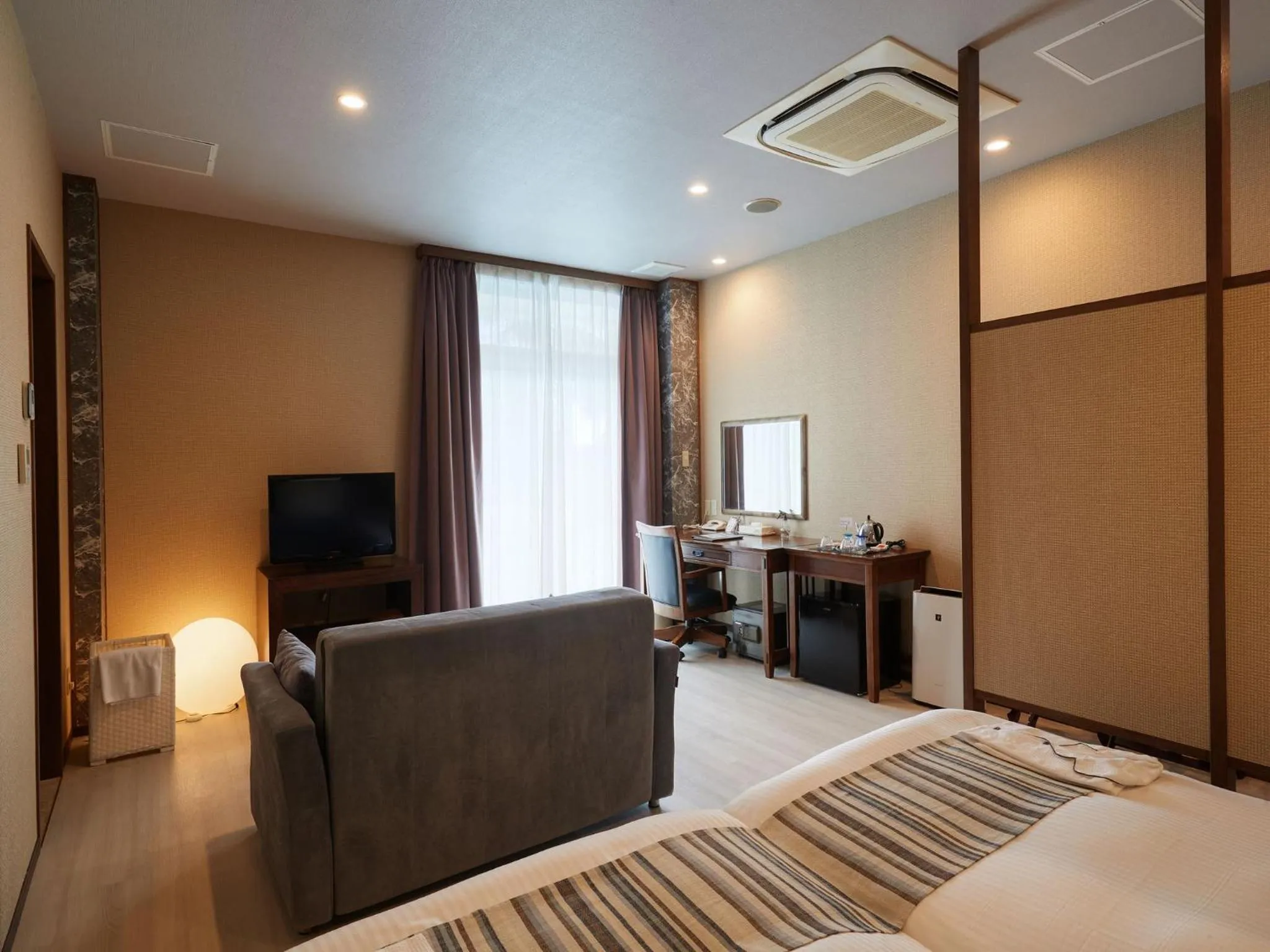 Photo of the whole room, Bed in La Casa Panacea Okinawa Resort