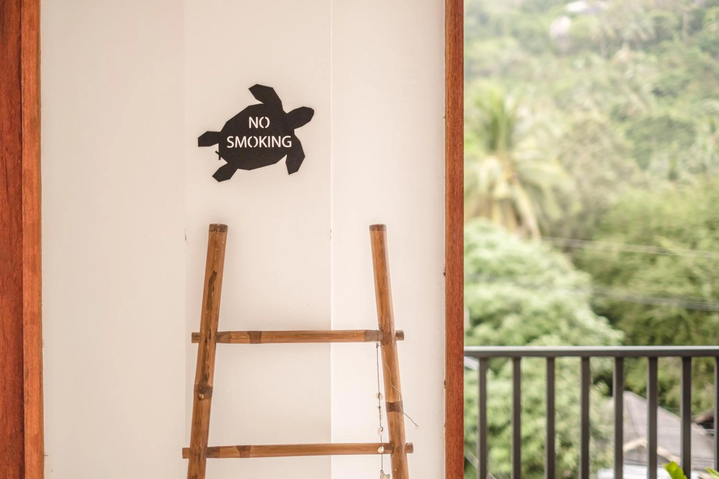 Communal lounge/ TV room in The Dearly Koh Tao Hostel-PADI 5 Star Dive Resort