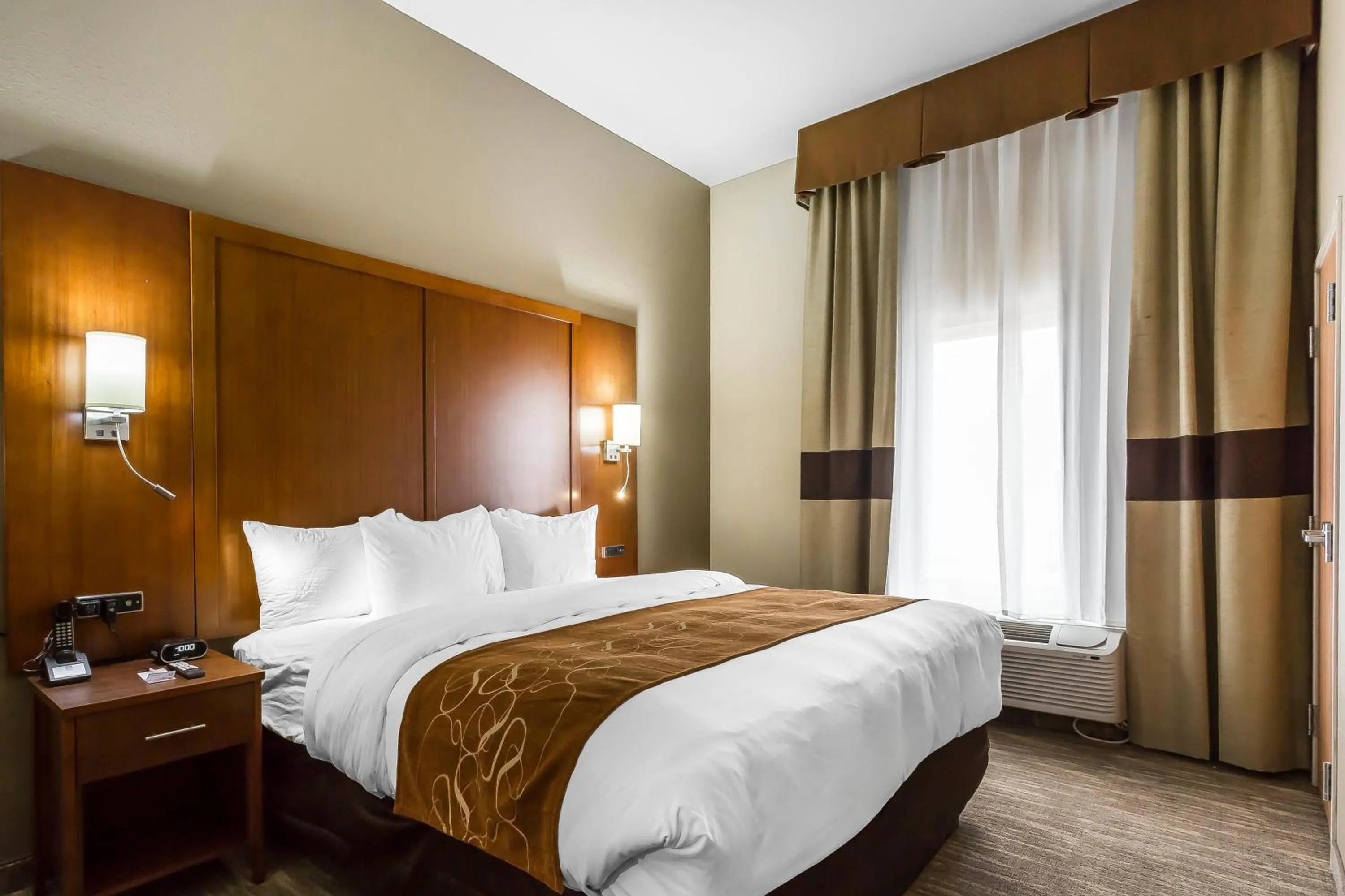 Bed in Comfort Suites - University