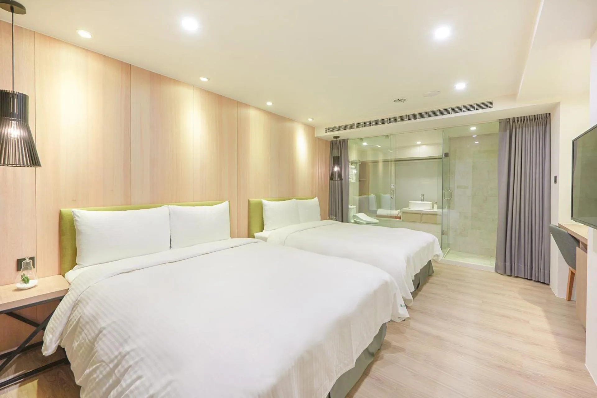 Photo of the whole room, Bed in Green Hotel - West District