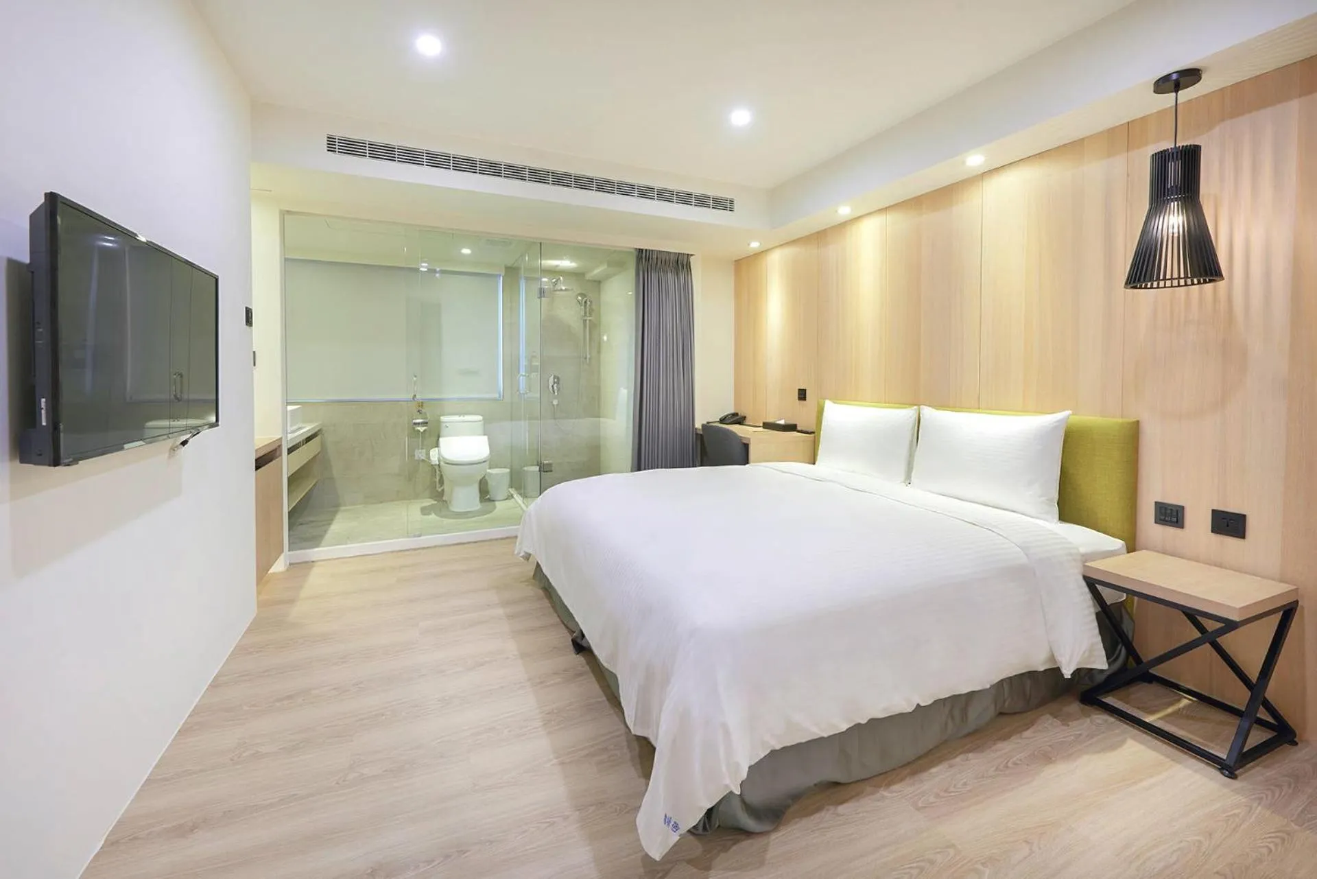 Photo of the whole room, Bed in Green Hotel - West District