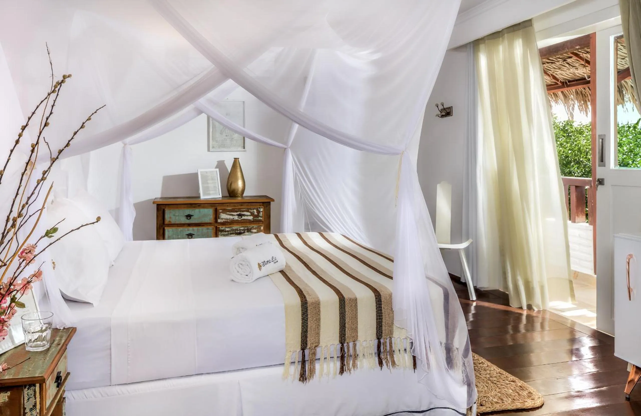 Bed in Mona Lisa Pousada