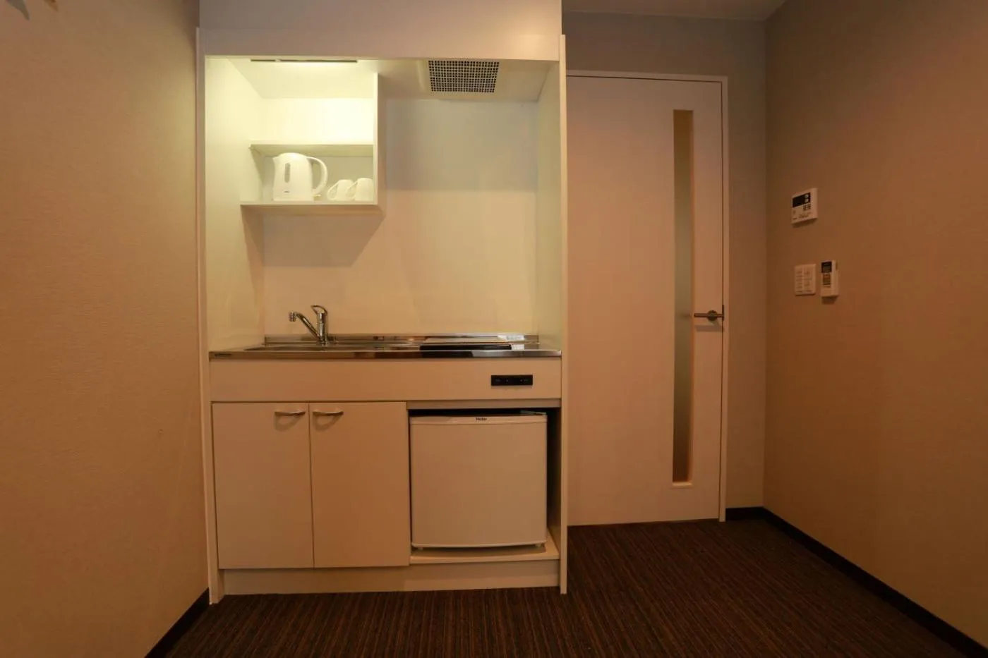 Kitchen or kitchenette in The Base Sakai Higashi Apartment Hotel