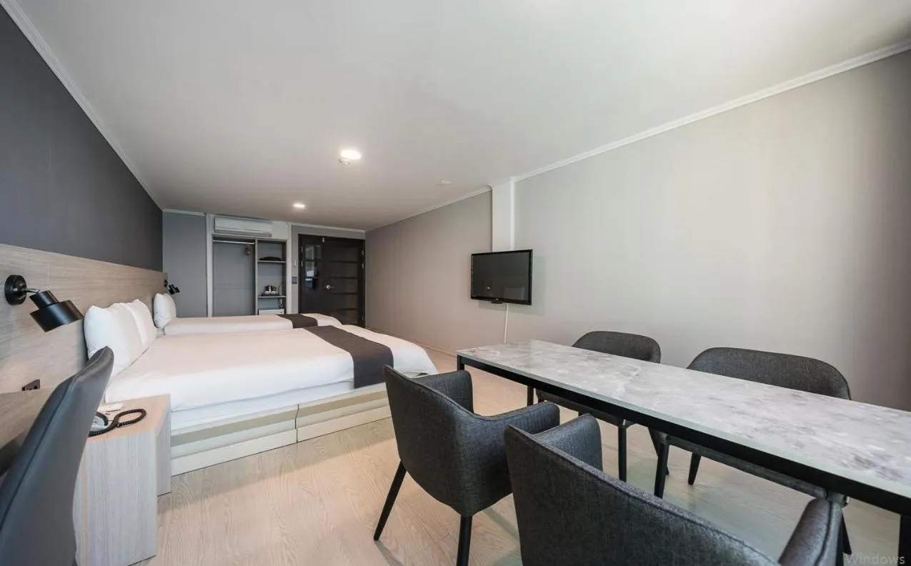 Bed in Gyeongpo Soo Hotel