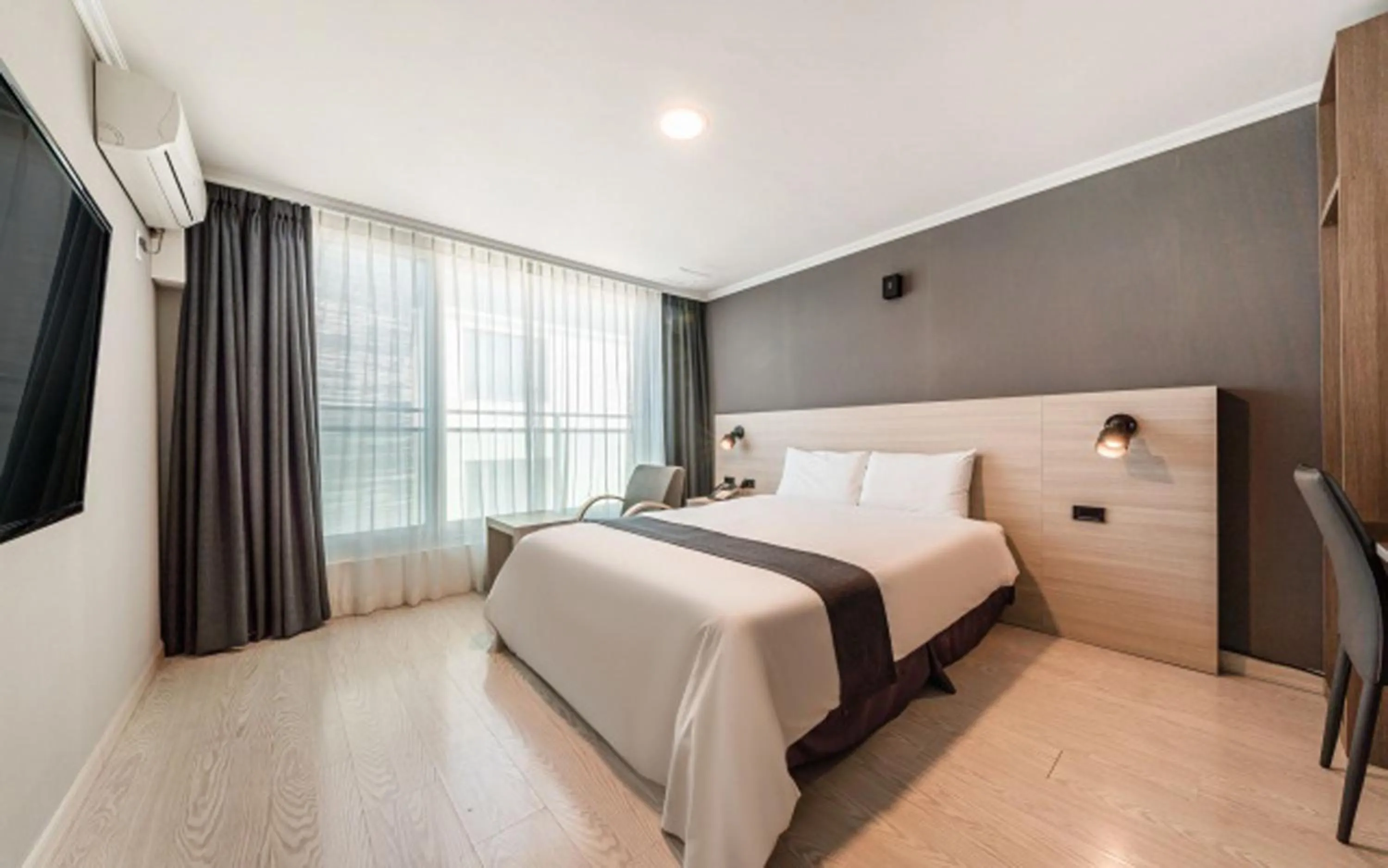 Bed in Gyeongpo Soo Hotel