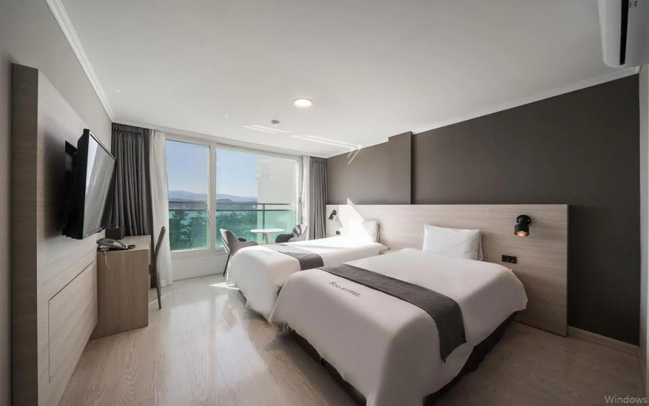 Bed in Gyeongpo Soo Hotel