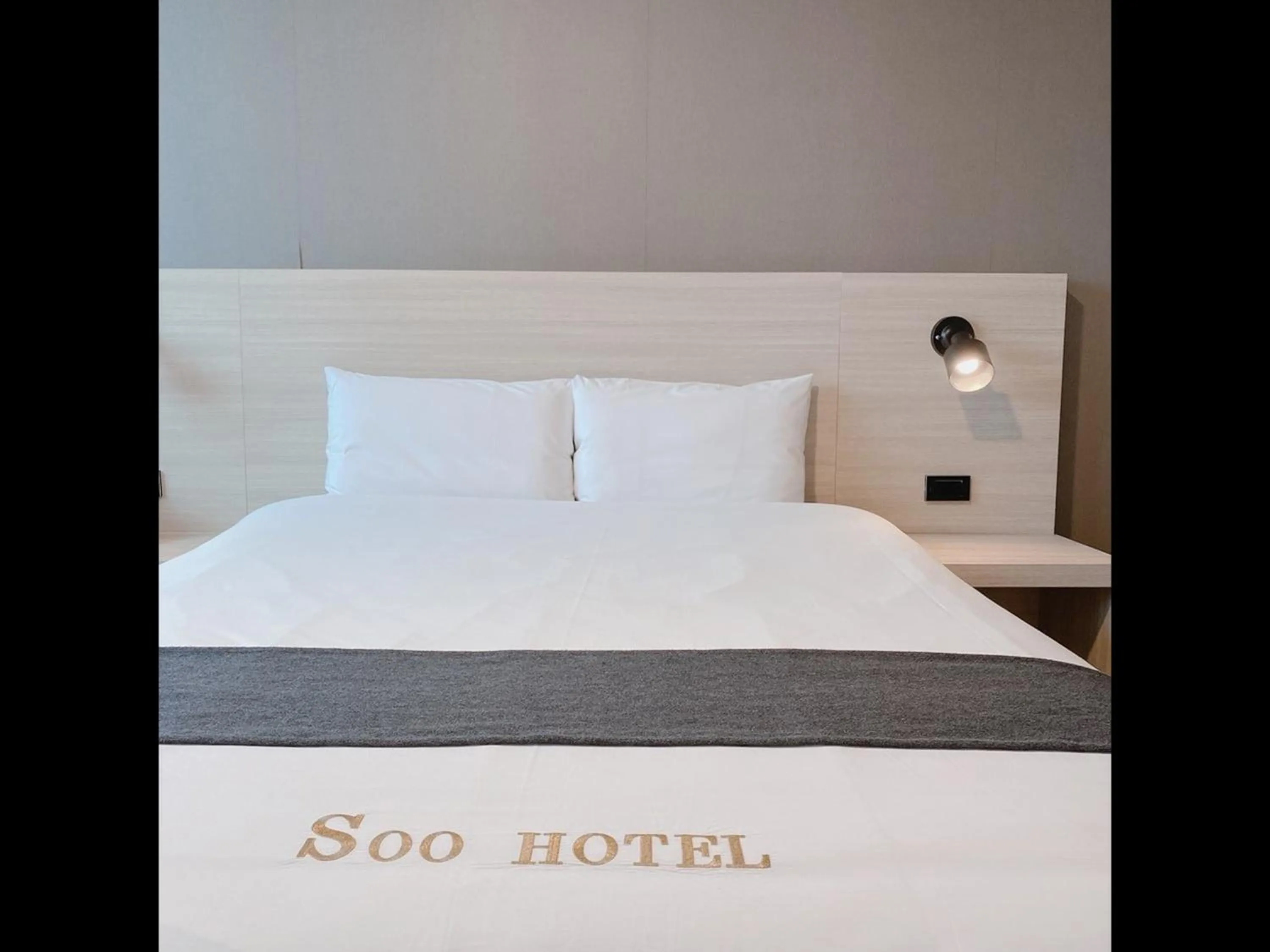 Bed in Gyeongpo Soo Hotel