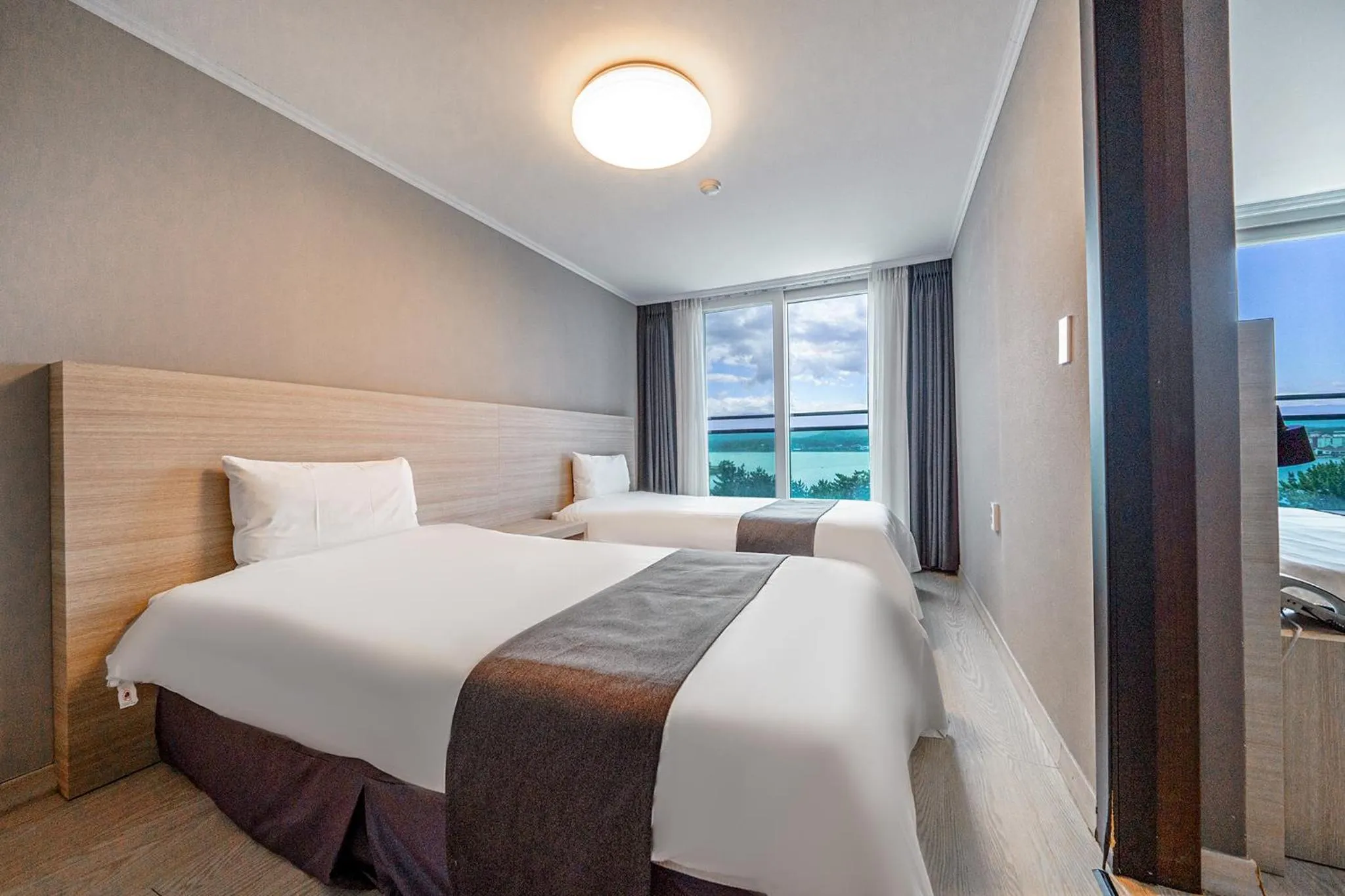 Bed in Gyeongpo Soo Hotel