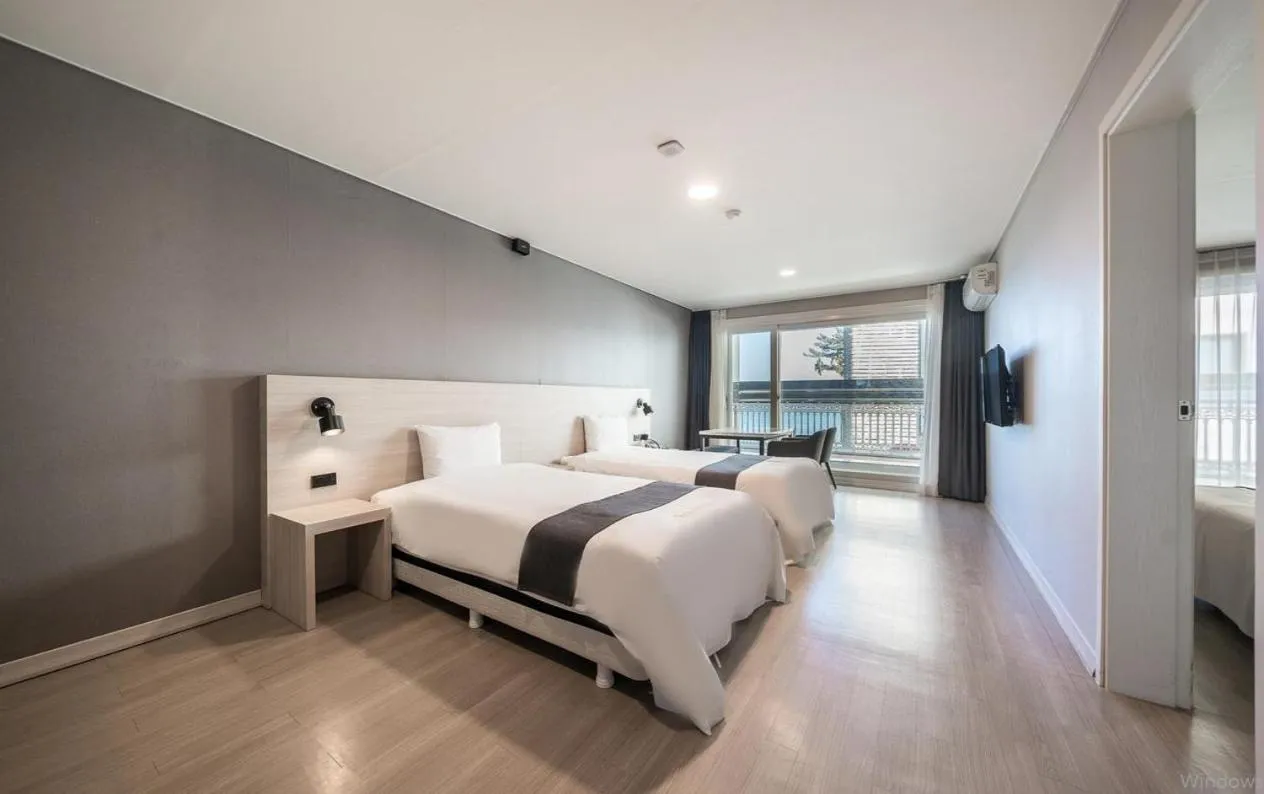 Bed in Gyeongpo Soo Hotel