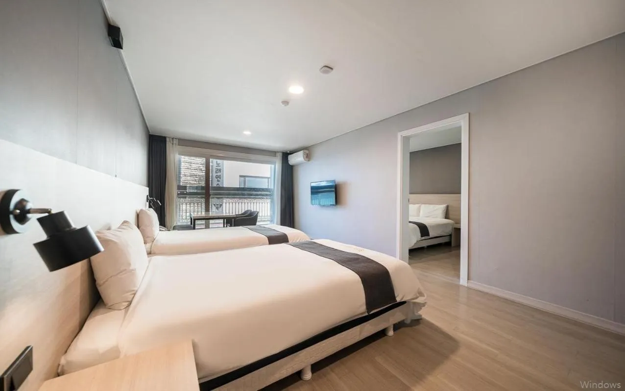 Bed in Gyeongpo Soo Hotel