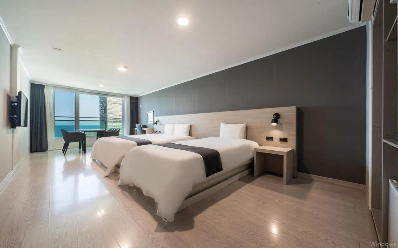 Bed in Gyeongpo Soo Hotel