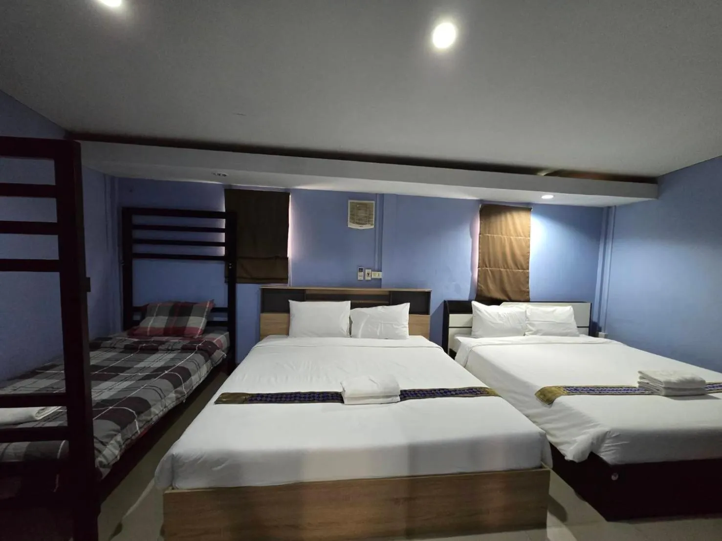 Bed in Baan Asree homestayบ้านอัสรี