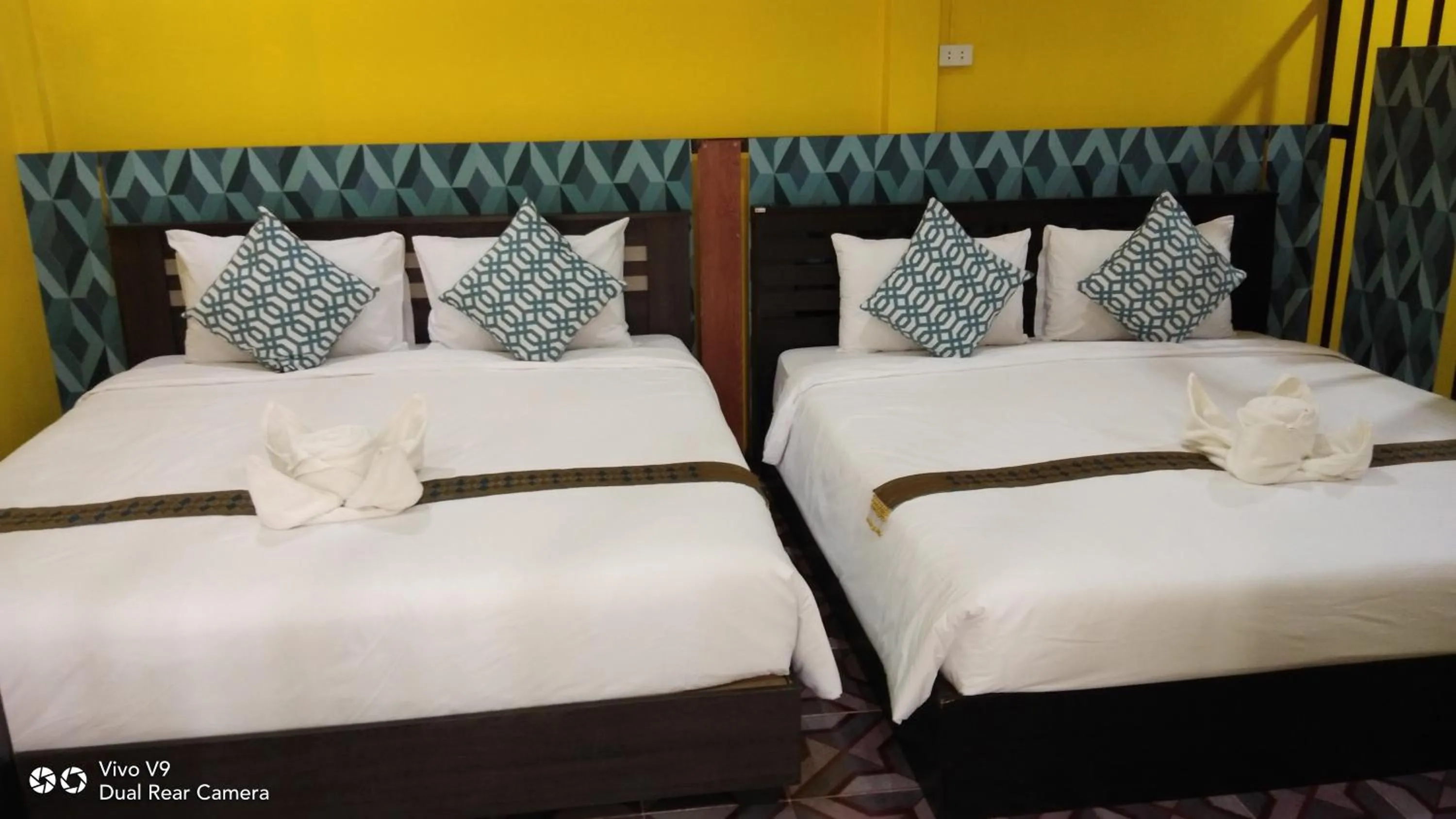 Bed in Baan Asree homestayบ้านอัสรี