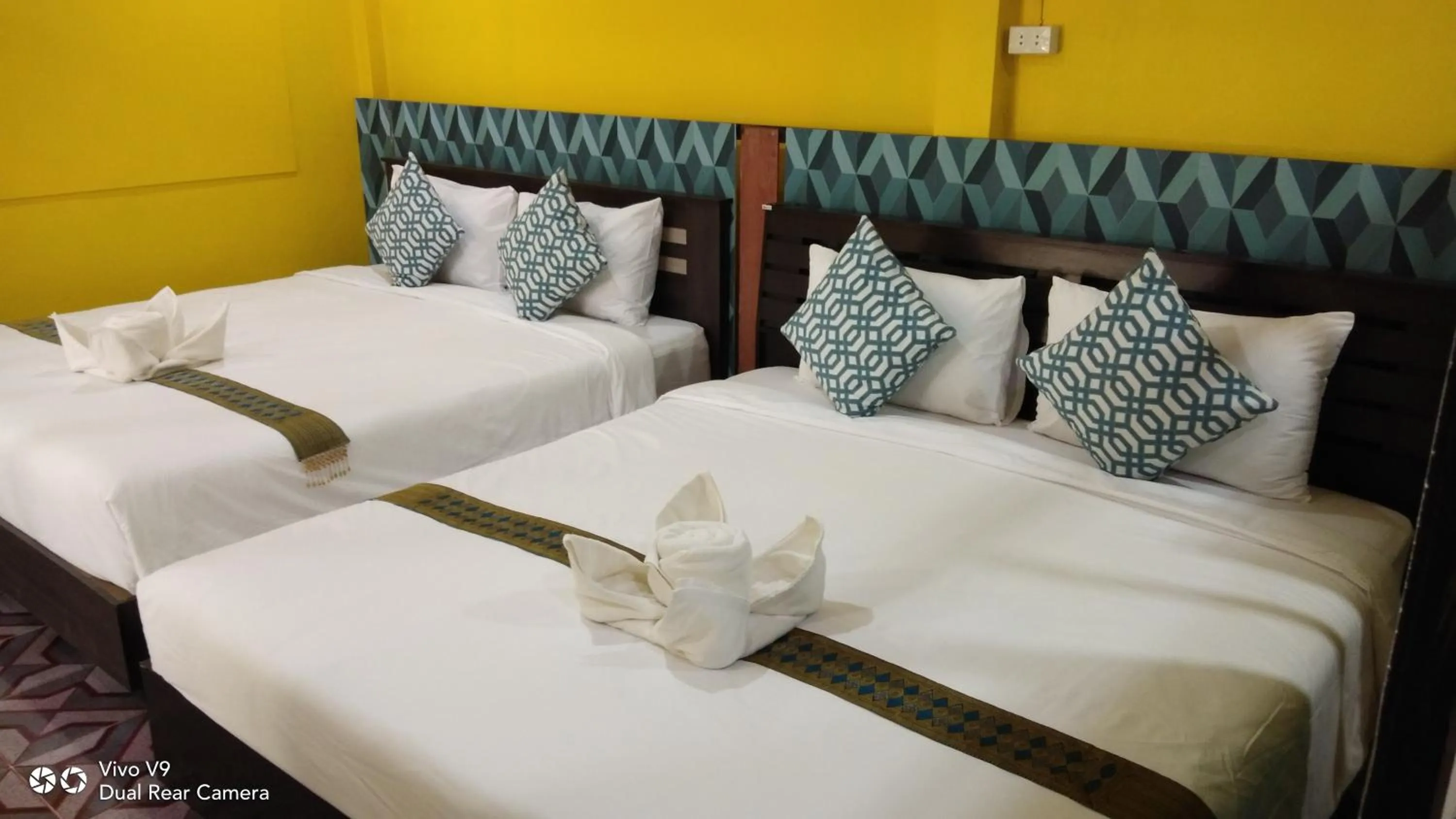 Bed in Baan Asree homestayบ้านอัสรี