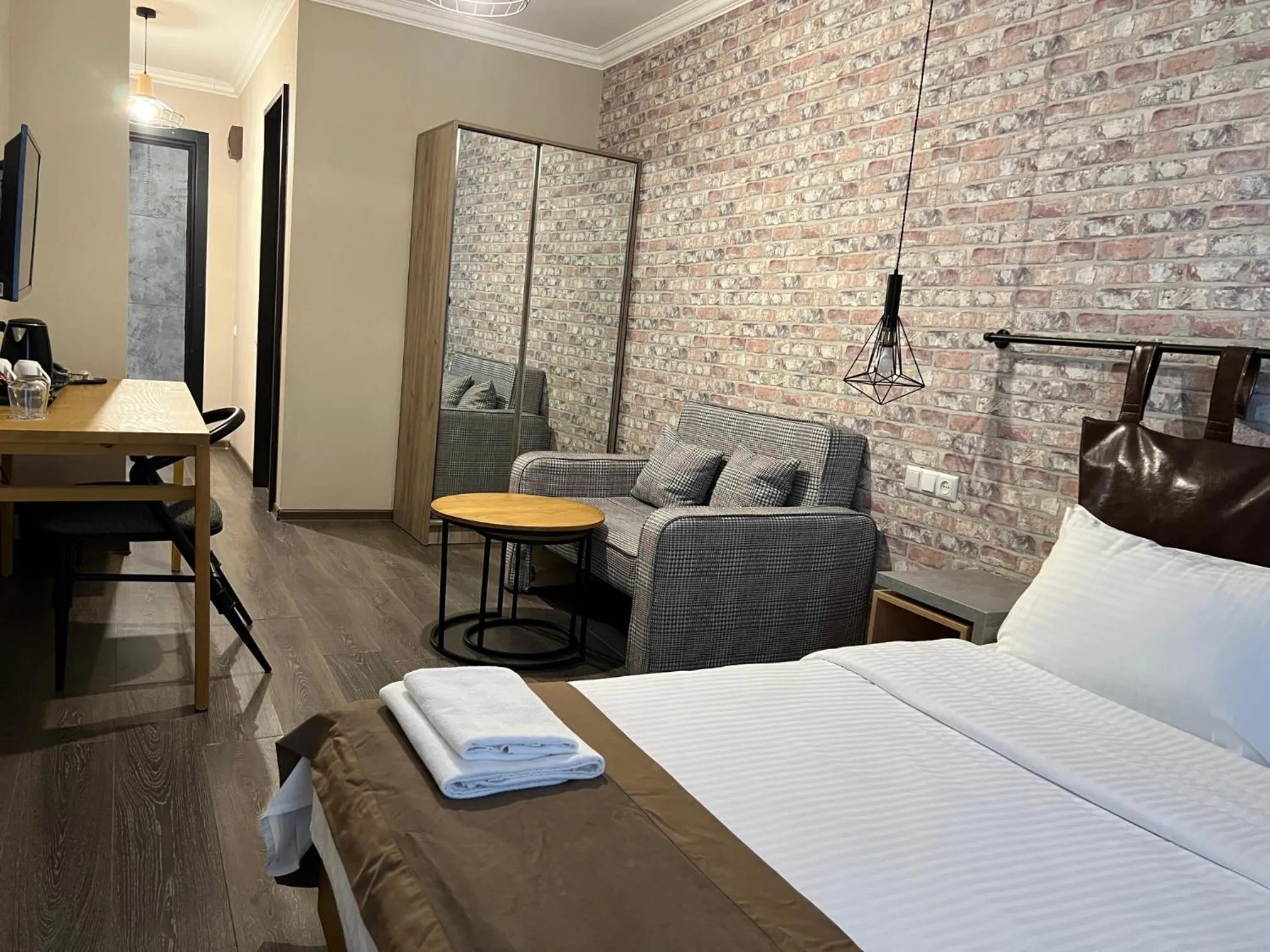 Seating area, Bed in Gudauri Loft Hotel