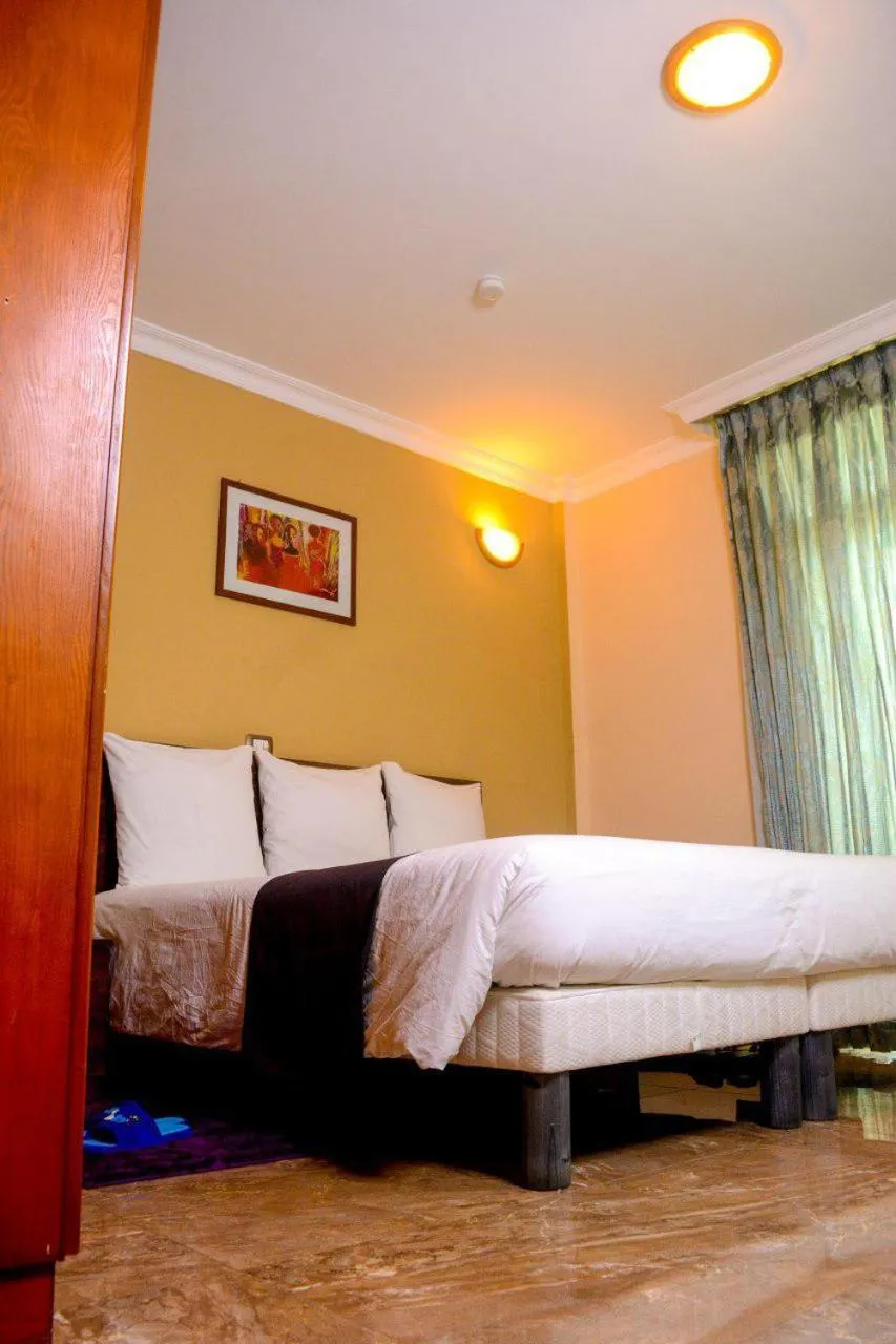 Bed in Melodie Hotel