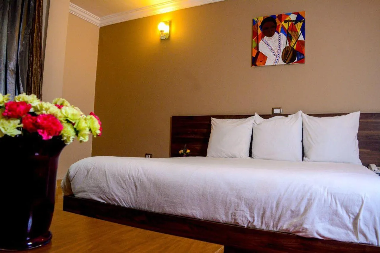 Bed in Melodie Hotel