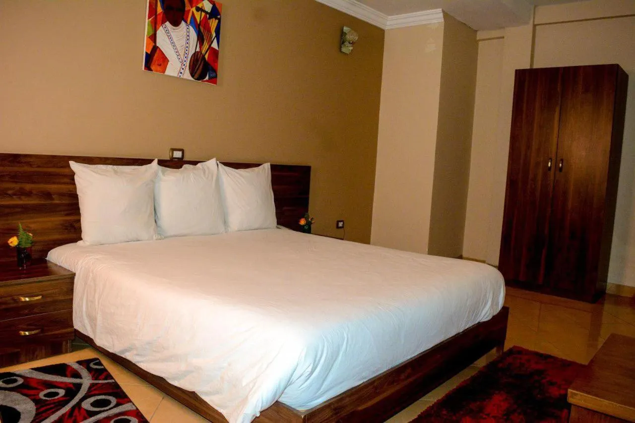 Bed in Melodie Hotel