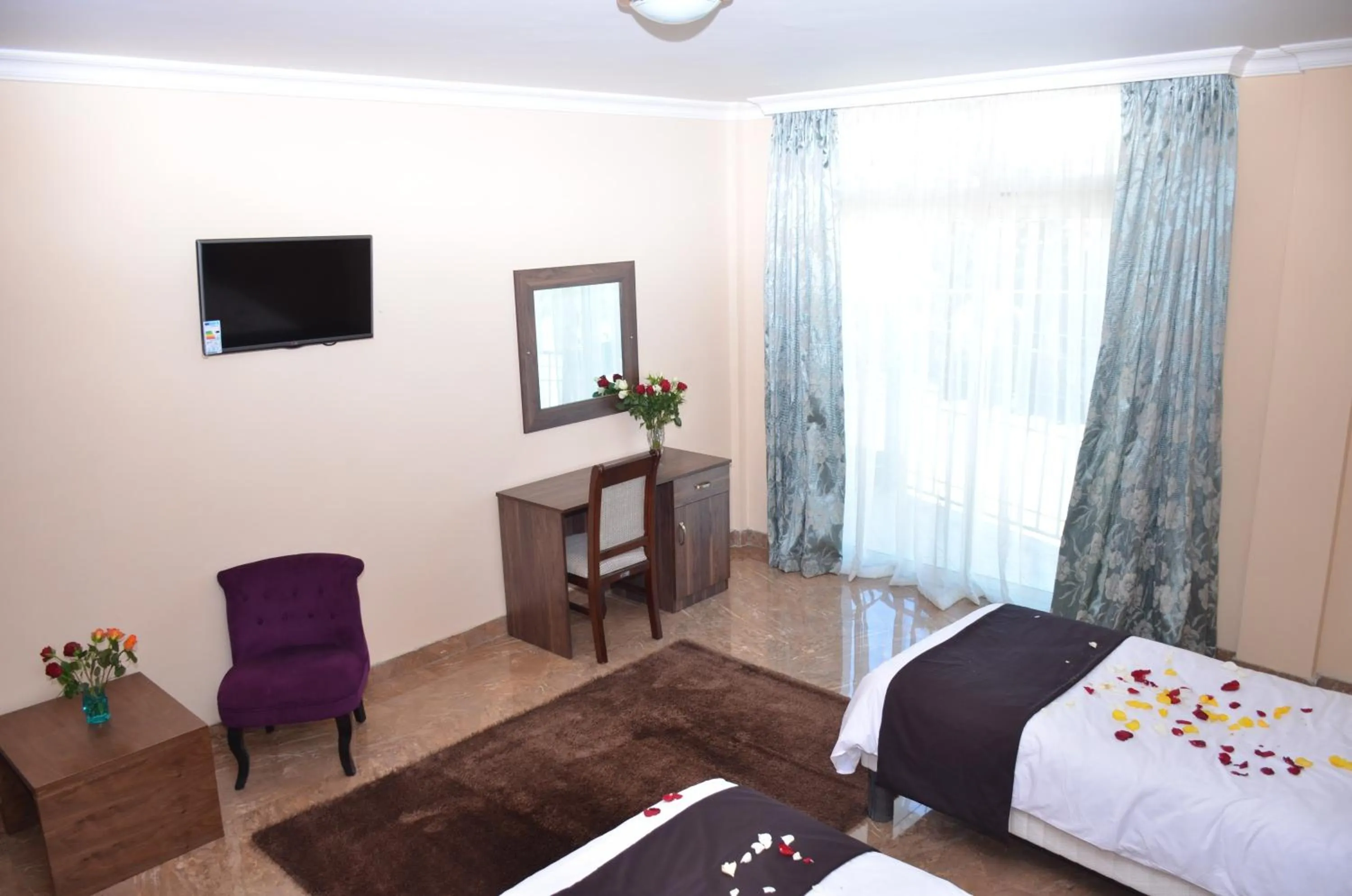 TV and multimedia, Bed in Melodie Hotel