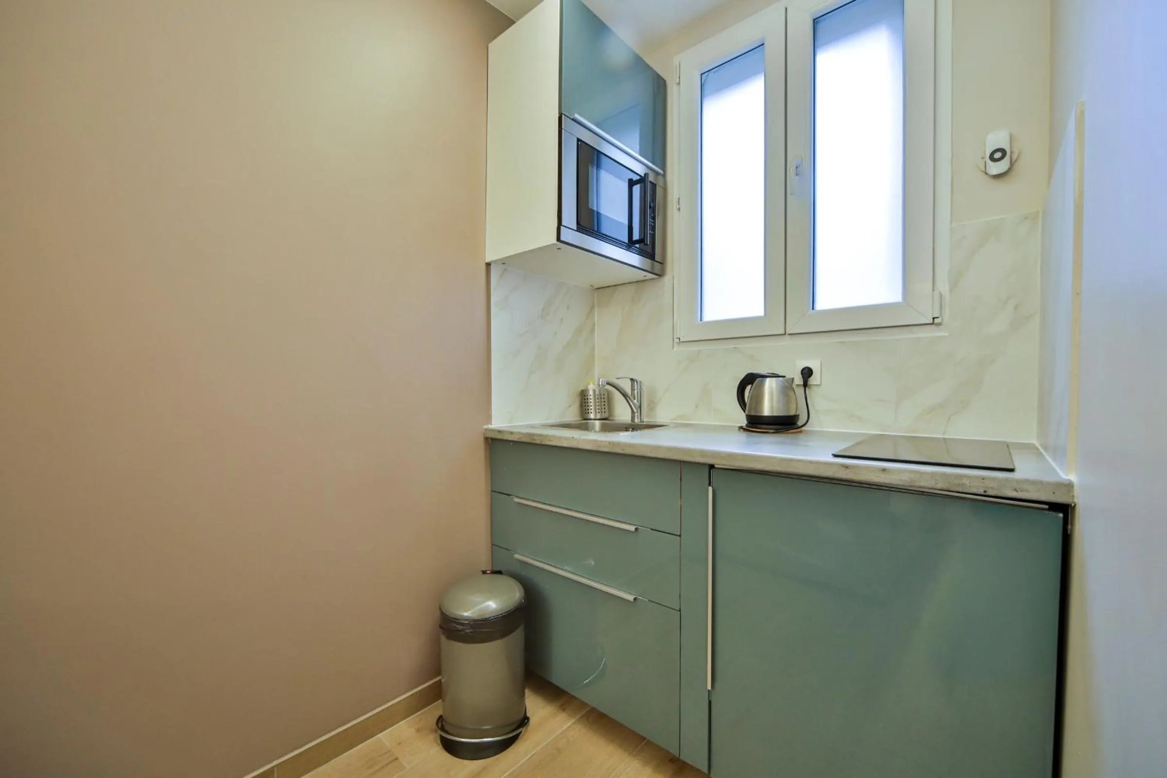 Kitchen or kitchenette in Blue Nights Apartments - Sébastopol