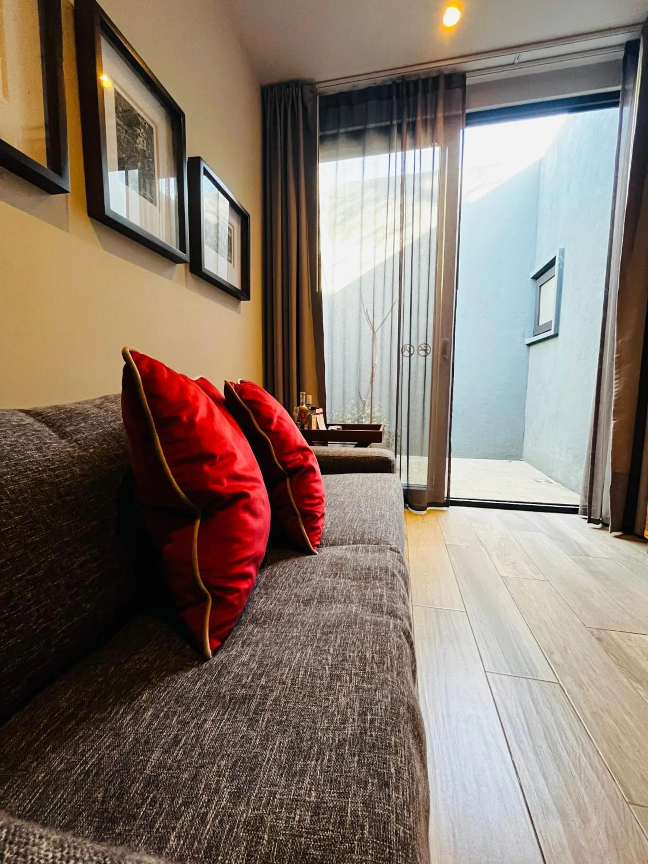 Seating area, Bed in El Callejón Hotel Boutique
