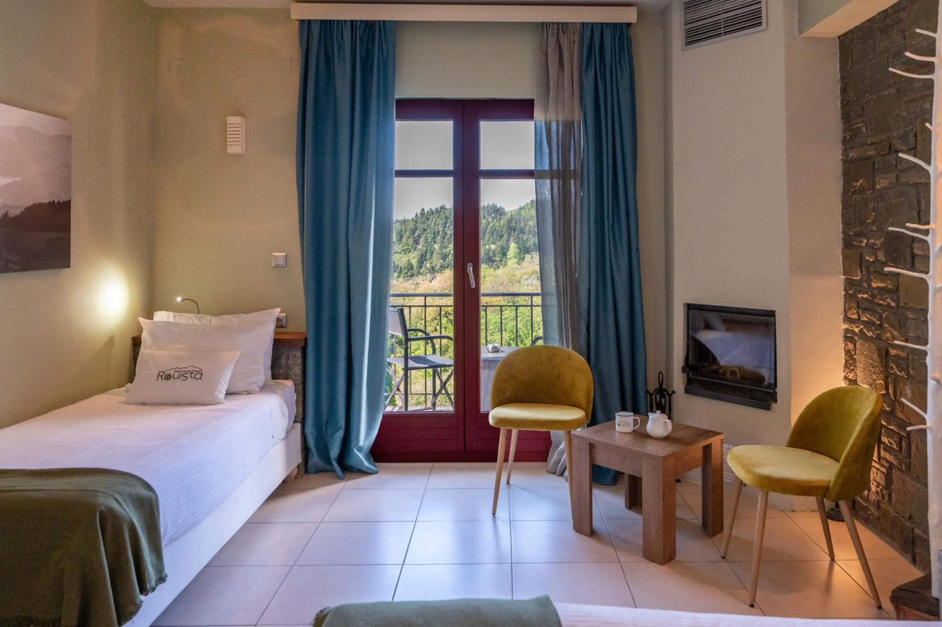 Photo of the whole room, Bed in Rouista Tzoumerka Resort