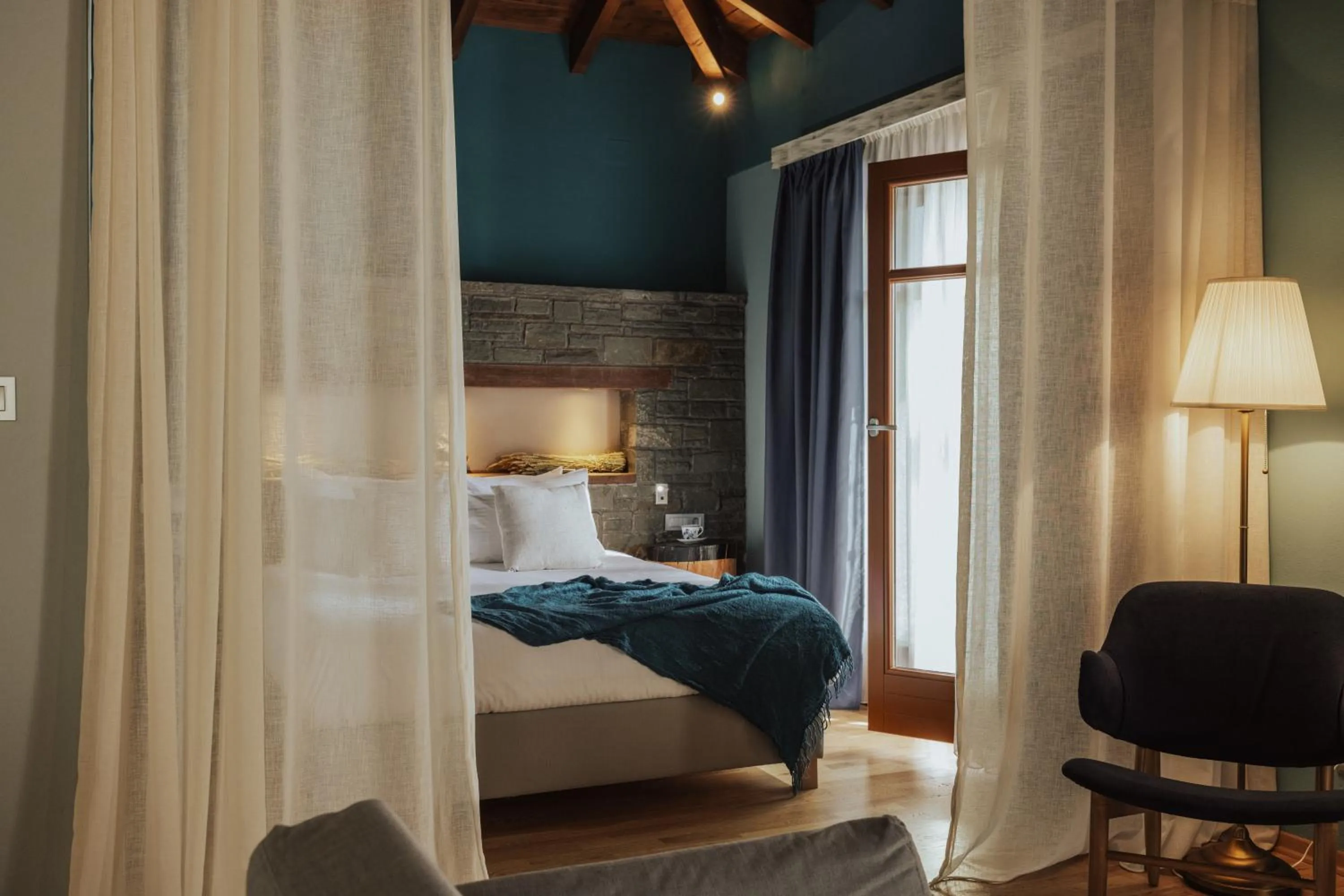 Bed in Rouista Tzoumerka Resort