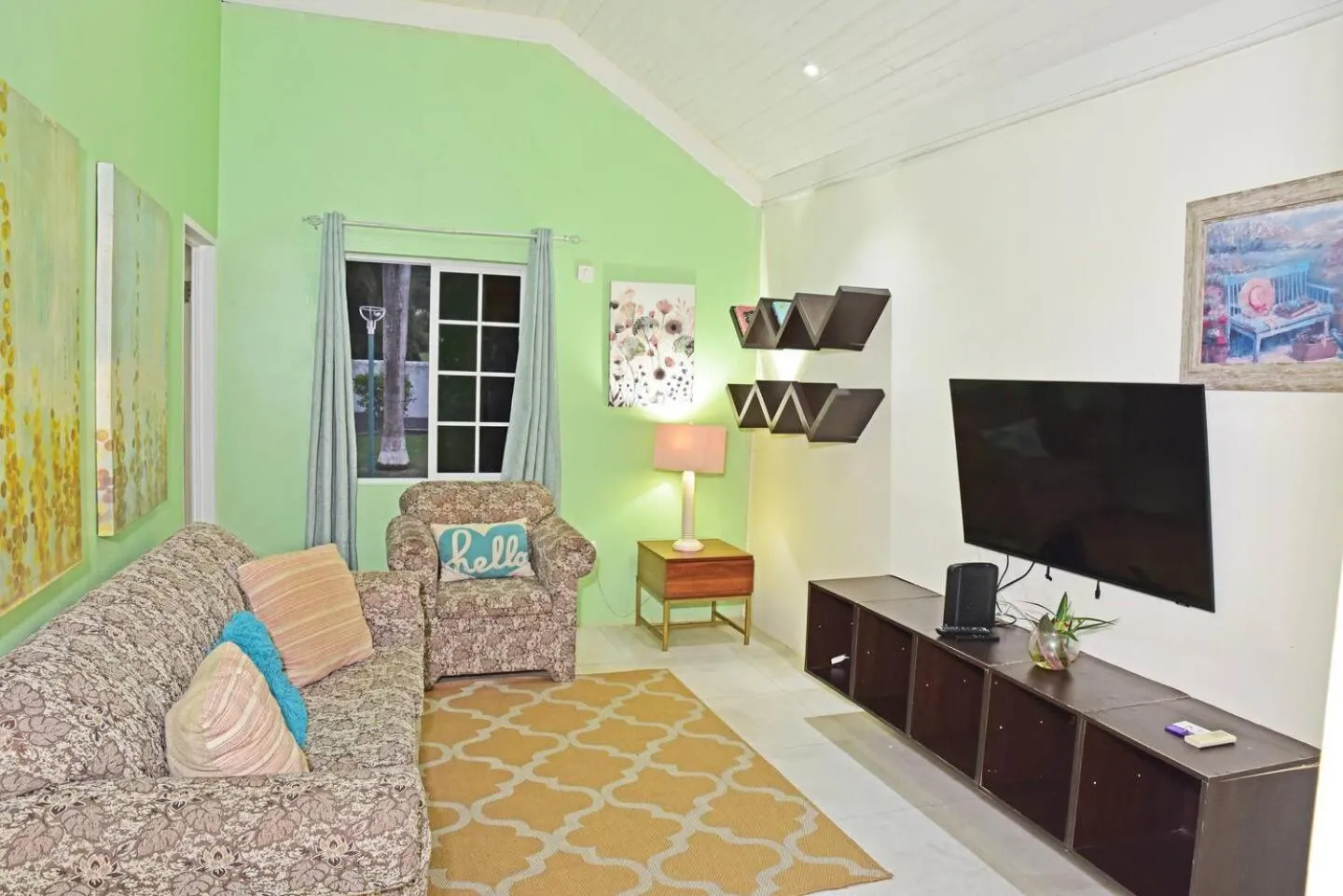 Communal lounge/ TV room in Seacastles by the beach/pool