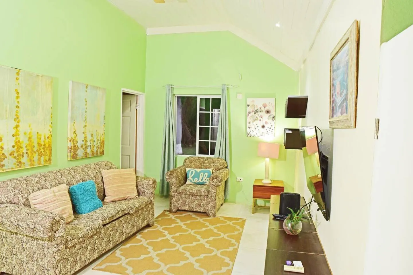 Communal lounge/ TV room in Seacastles by the beach/pool