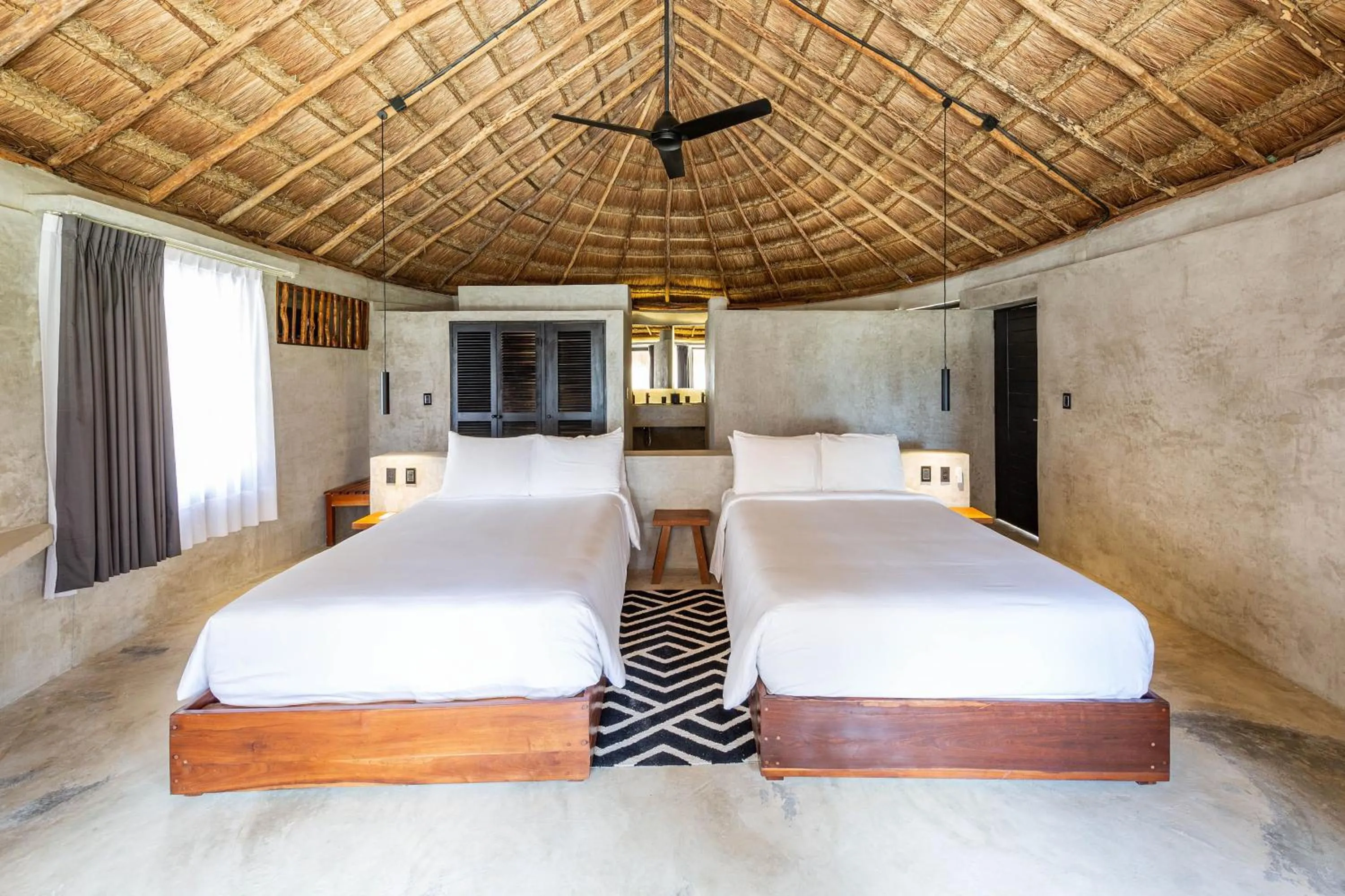 Bed in Maya Tulum By G Hotels