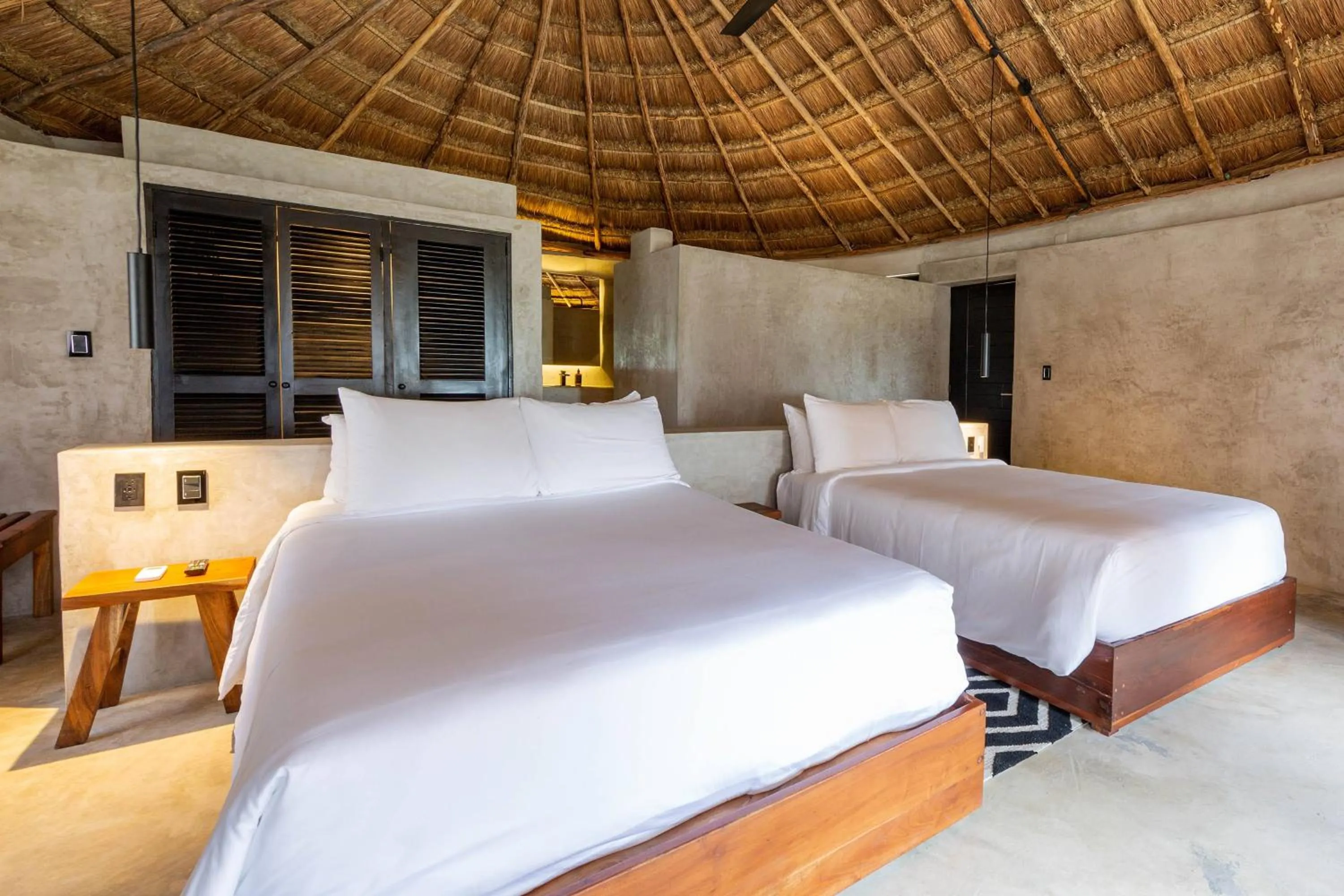Bed in Maya Tulum By G Hotels