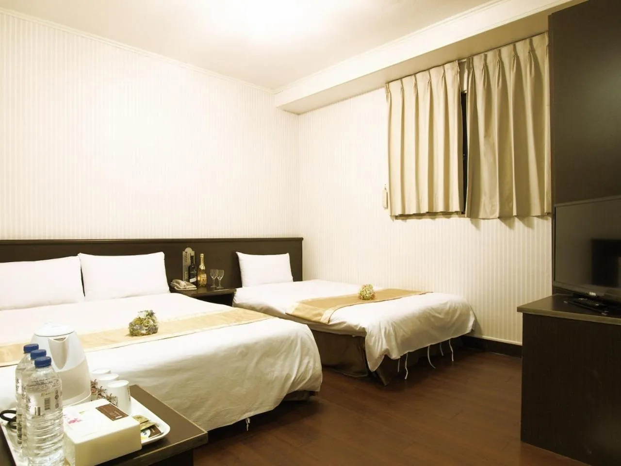 Bed in Yi Pin Yuan Hotel