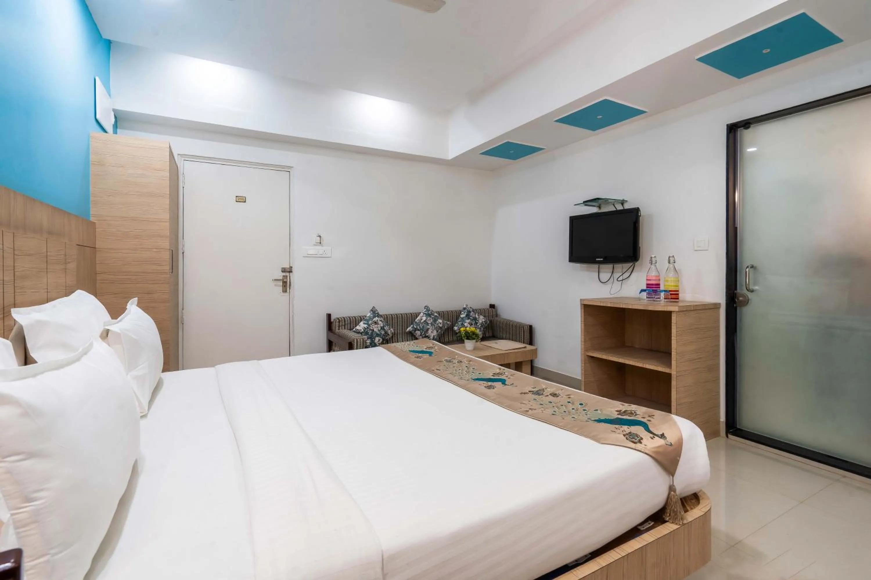 Bed in Hotel Ashish Palace