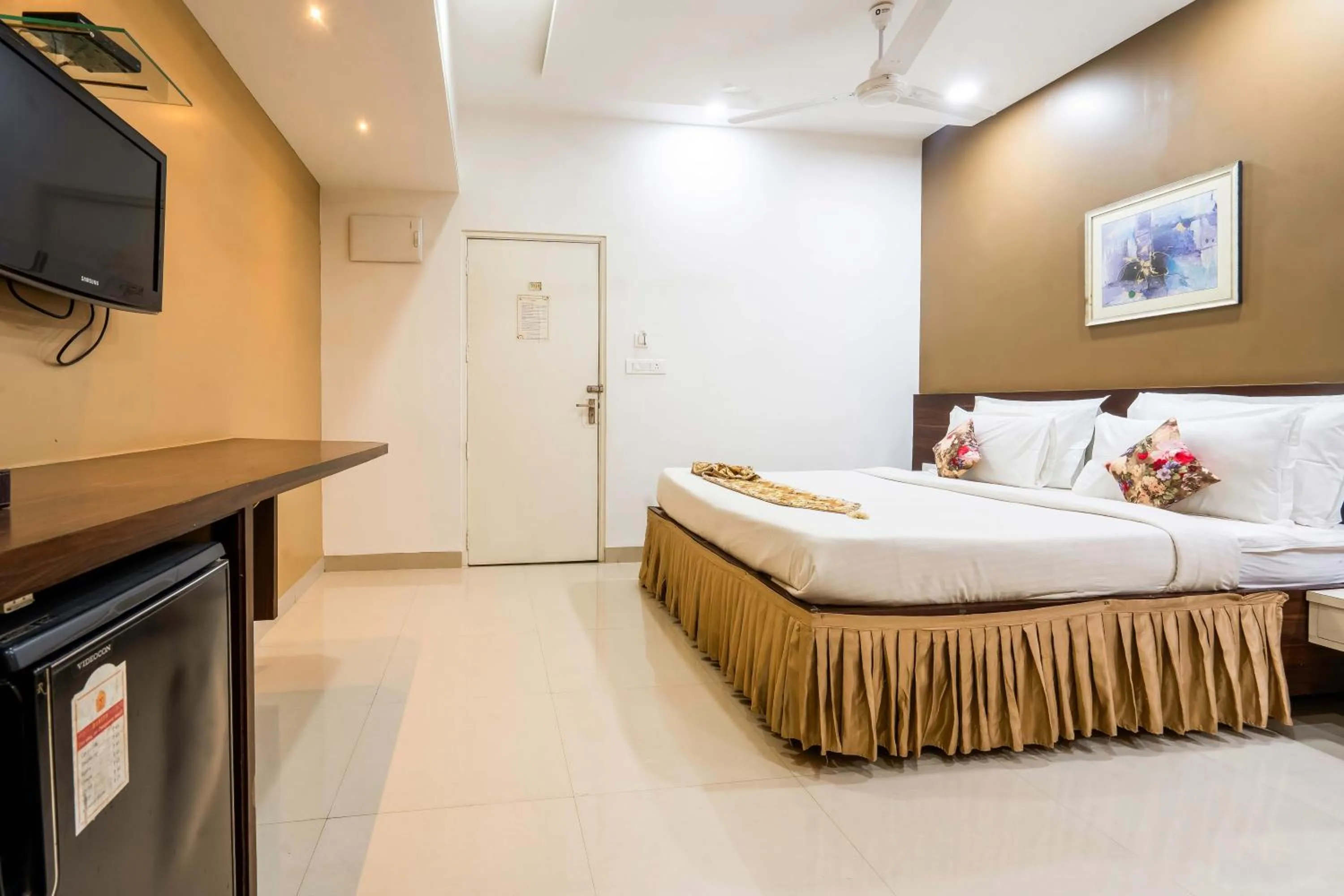 Bed in Hotel Ashish Palace