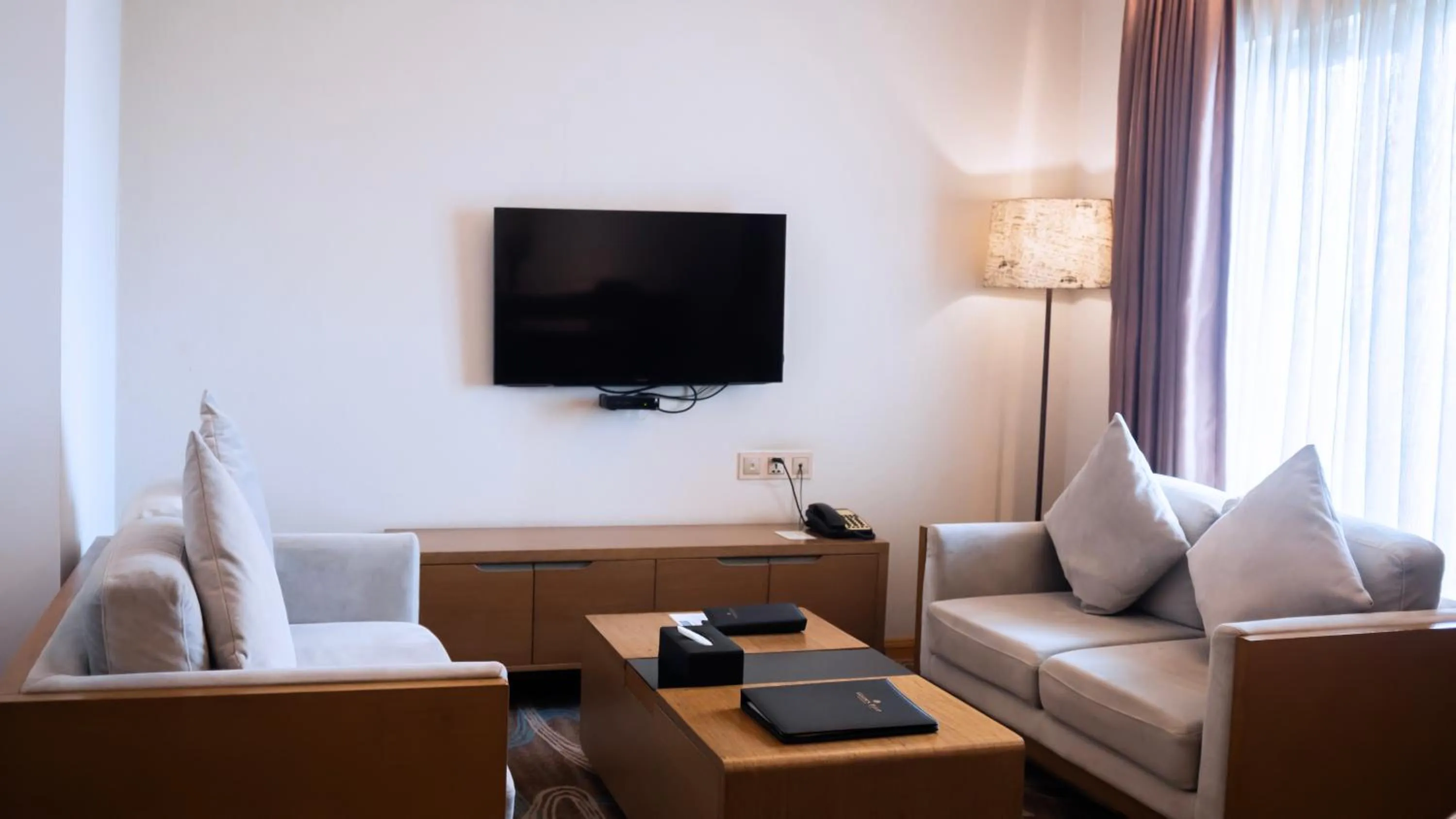 Communal lounge/ TV room in Golden Tulip The Grandmark-Dhaka