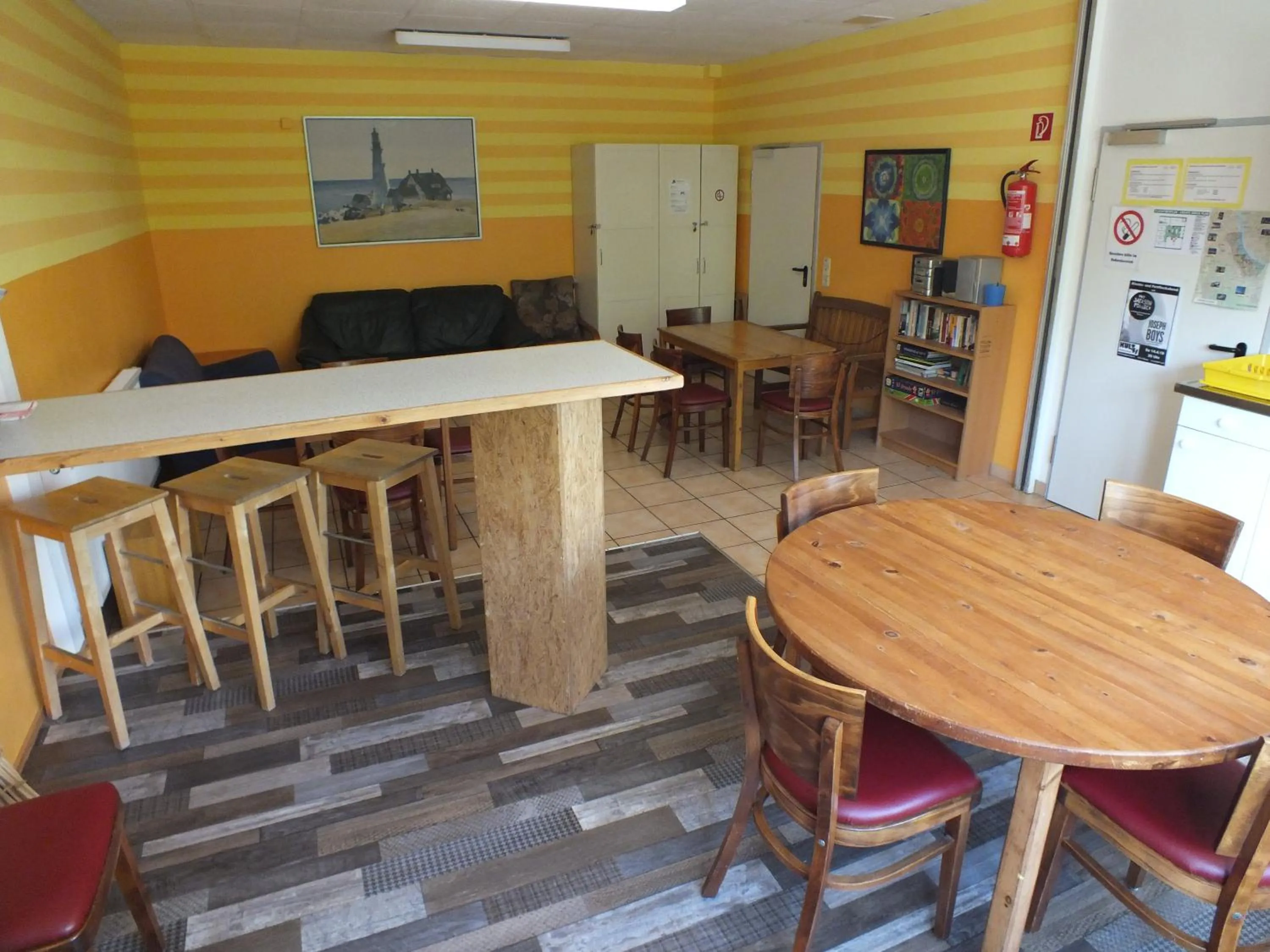 Communal lounge/ TV room in Max Hostel