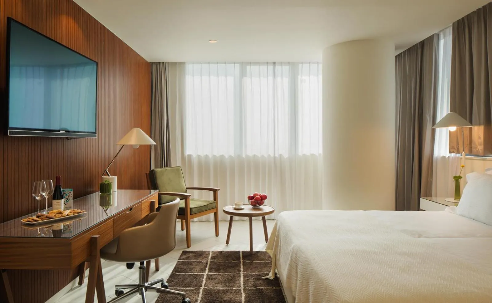 Photo of the whole room, Bed in Prima Millennium