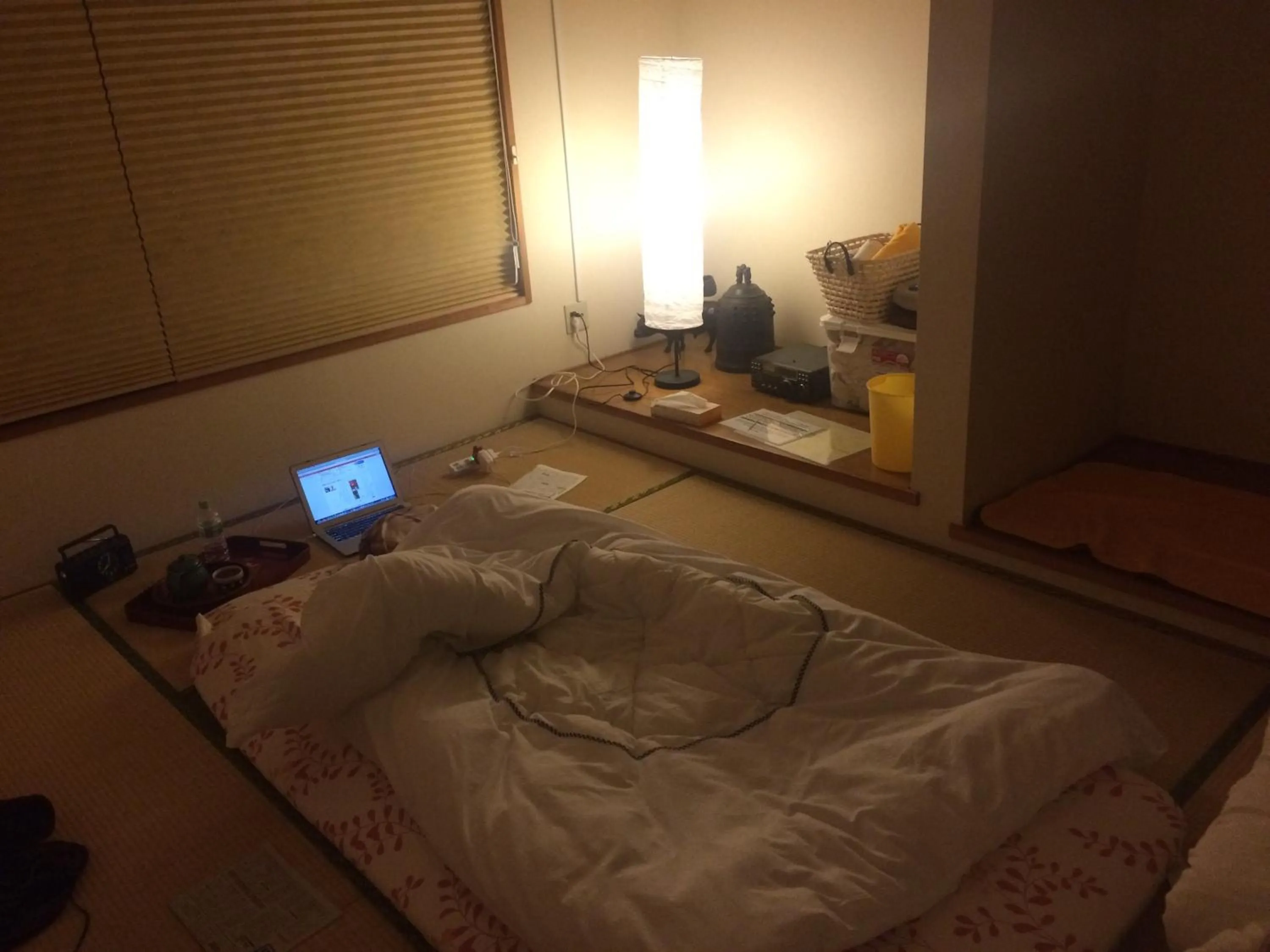 Bed in Wholeearth Ryokan Hiroshima