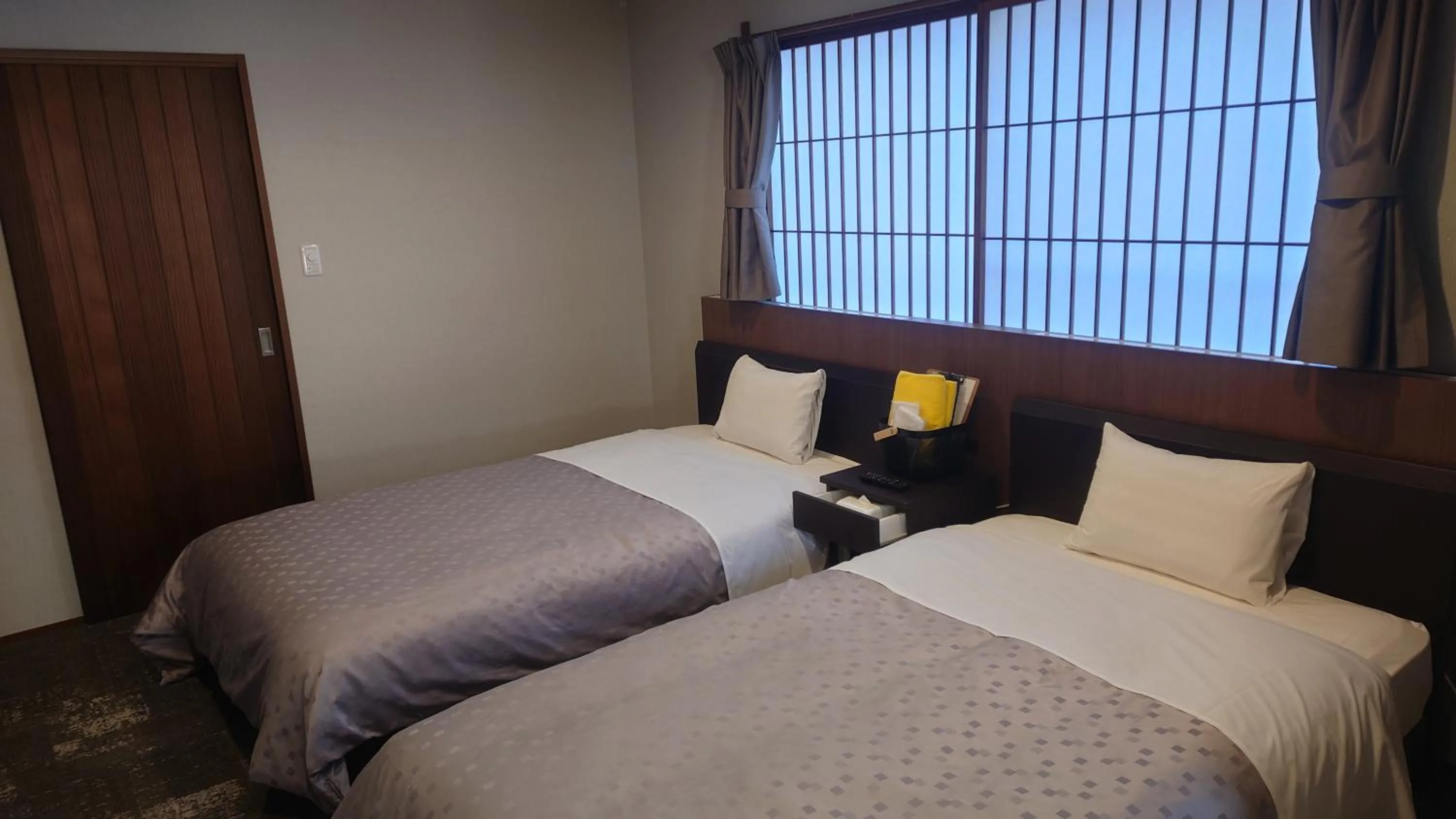 Bed in Hotel Hirayunomori Annex