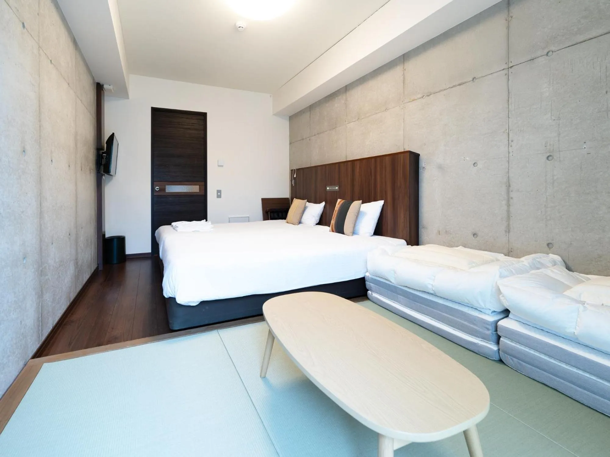 Photo of the whole room, Bed in The BREAKFAST HOTEL PORTO Ishigakijima