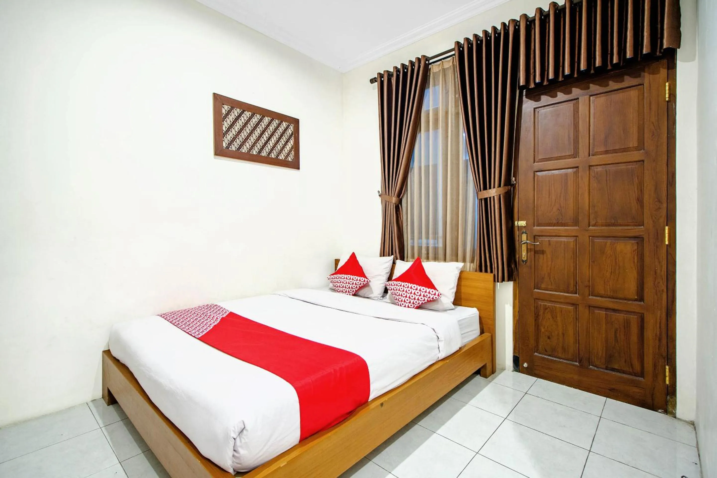 Bedroom in Super OYO 250 De'gadri Ndalem