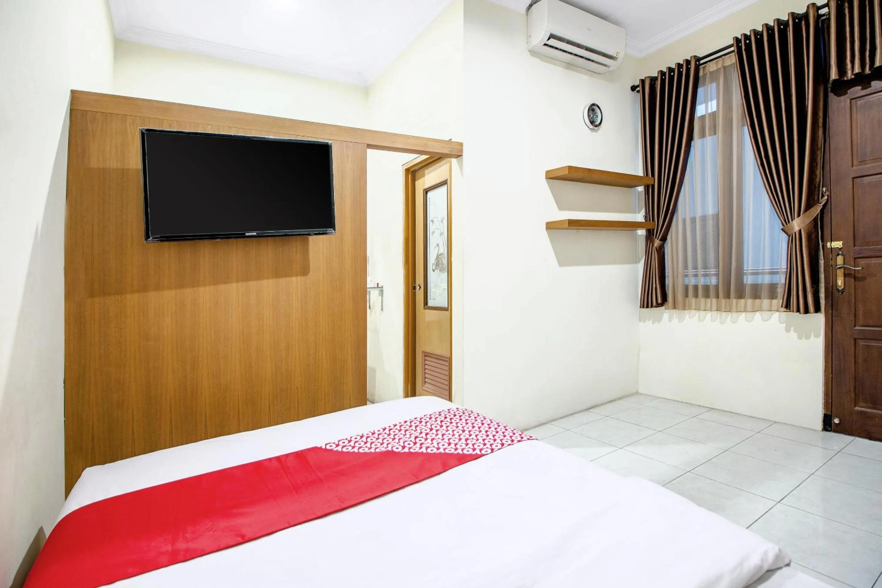 Bedroom in Super OYO 250 De'gadri Ndalem