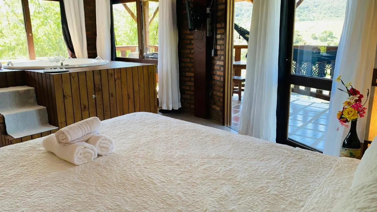 Bed in Pousada La Creación