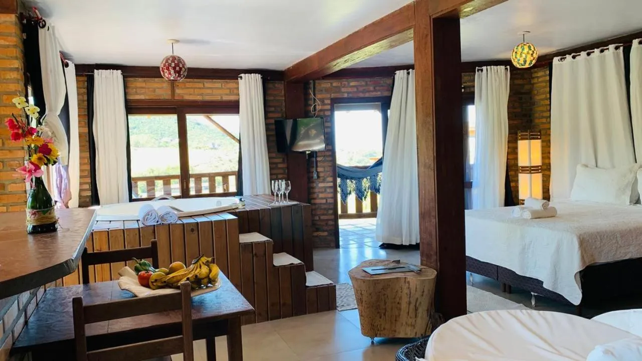 Bed in Pousada La Creación