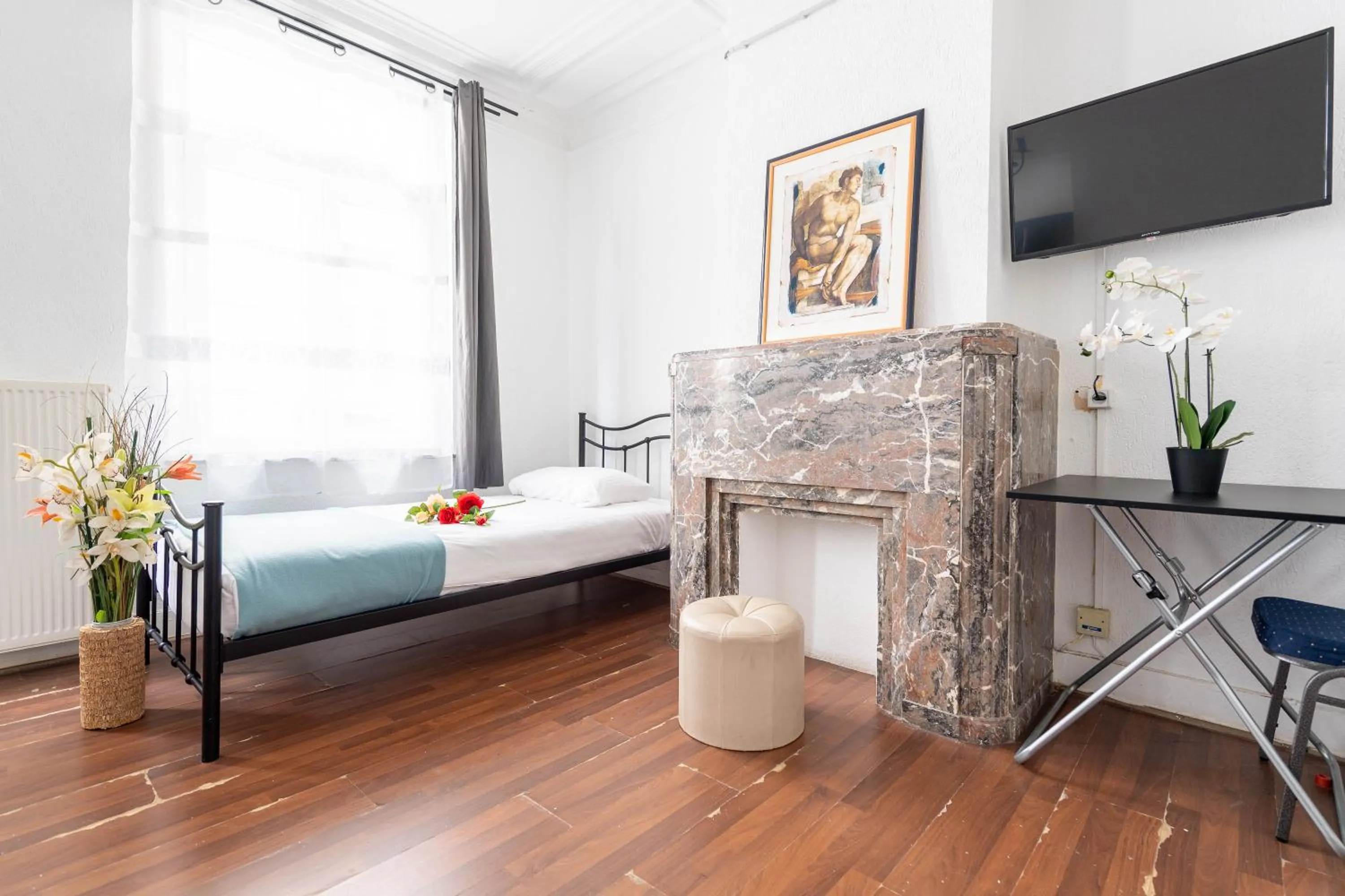 Bed in Hotel Le Grand Colombier